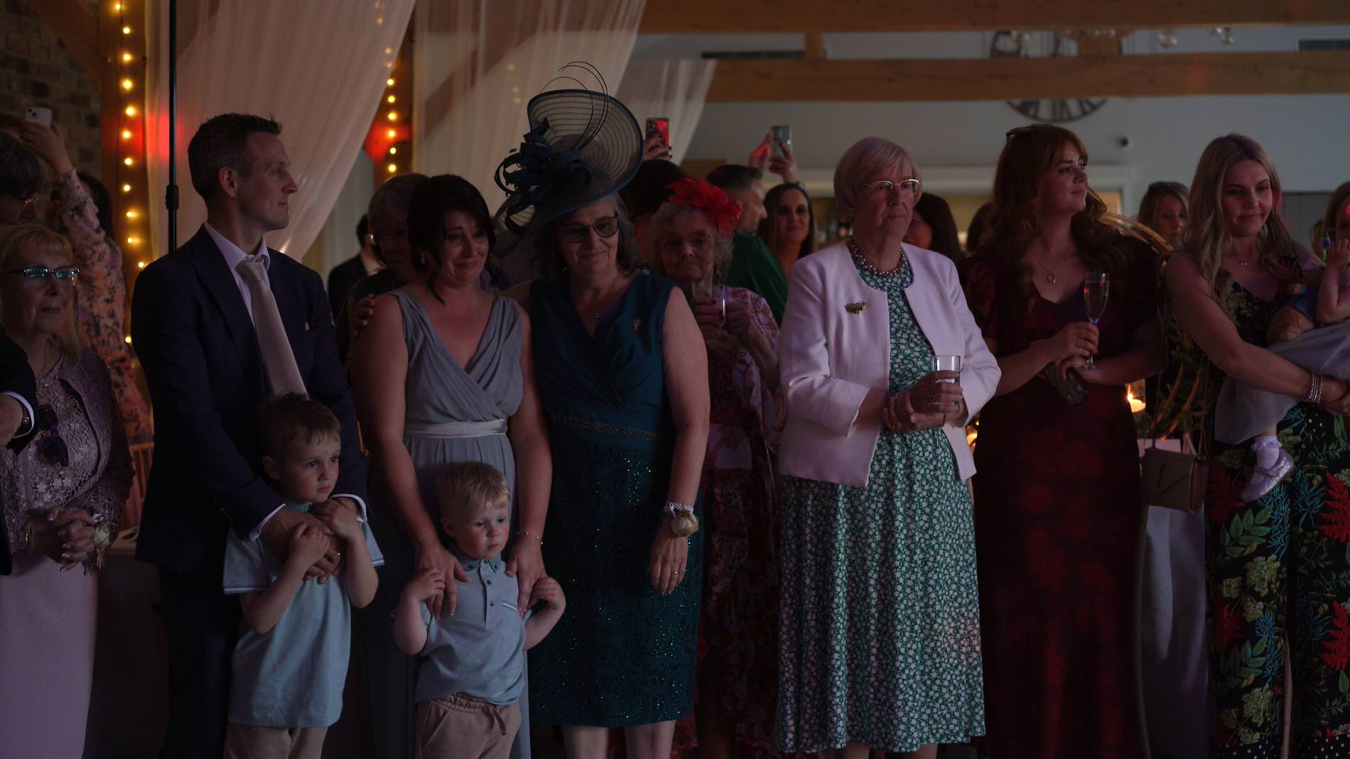 guests look emotional watching the father daughter dance