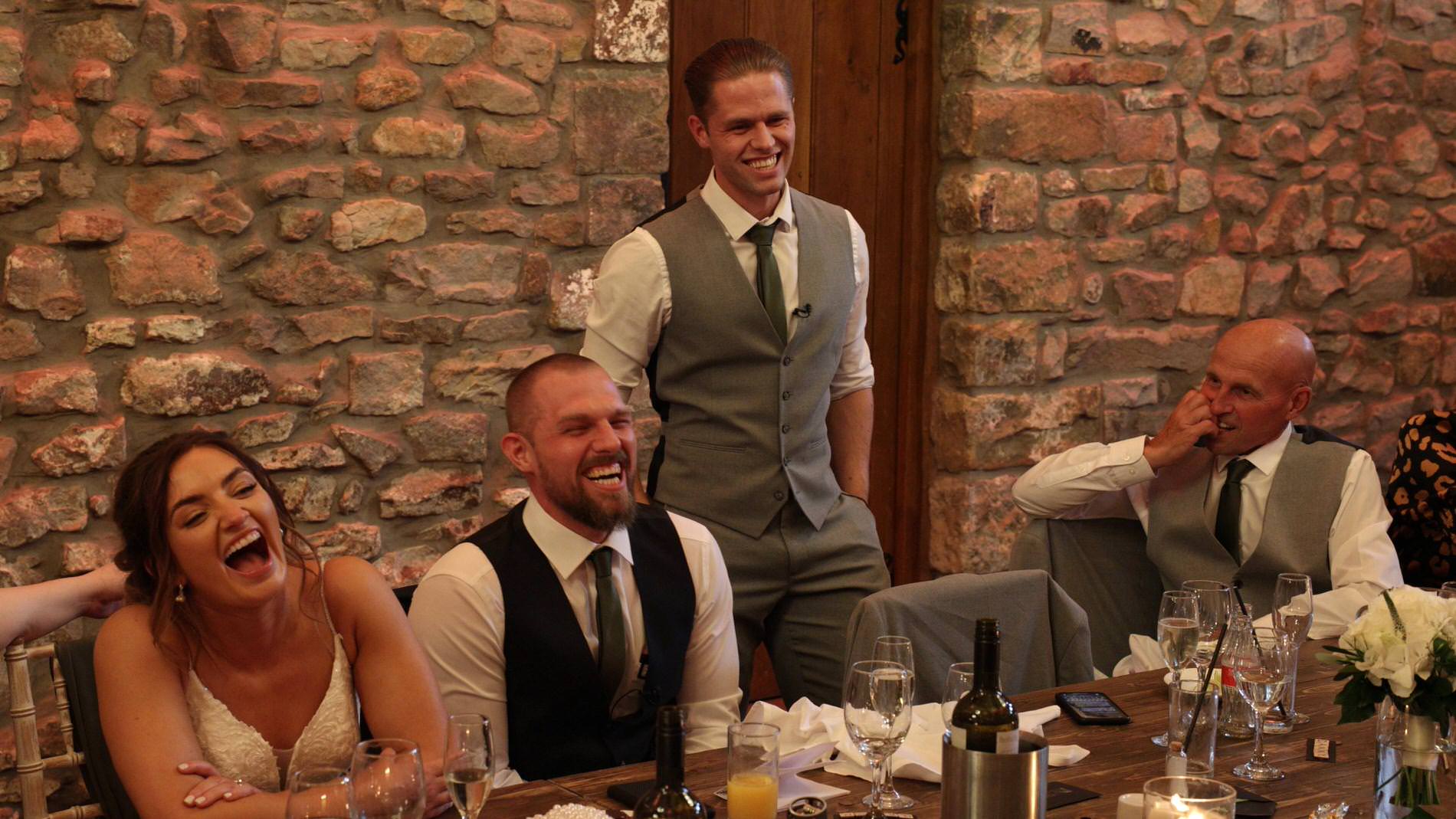Annabelle and Dean Browsholme Hall Wedding Video 26 the couple laugh out loud for the best mans speech