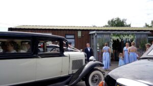 a wedding car arrives outside The Aviary in Ormskirk