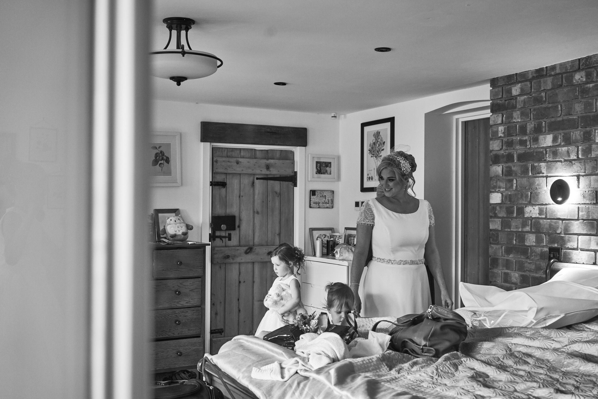 a documentary style wedding morning photo of the bride getting ready
