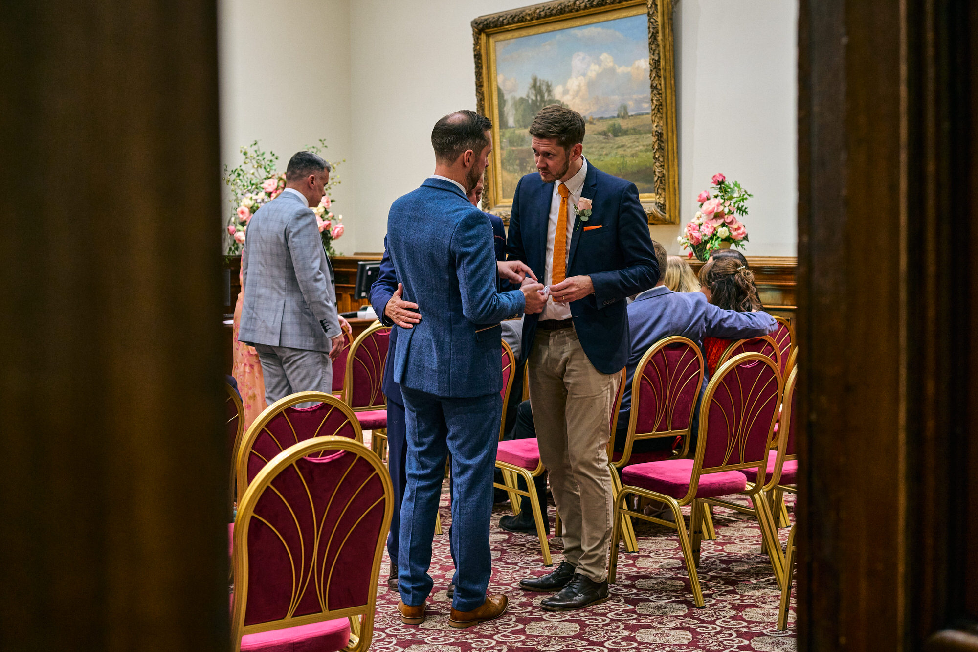 The Groom and Best Man chat before the ceremony at St Georges Hall in Liverpool