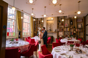 a couple take a moment in the private dining room at The Art School Liverpool Restaurant