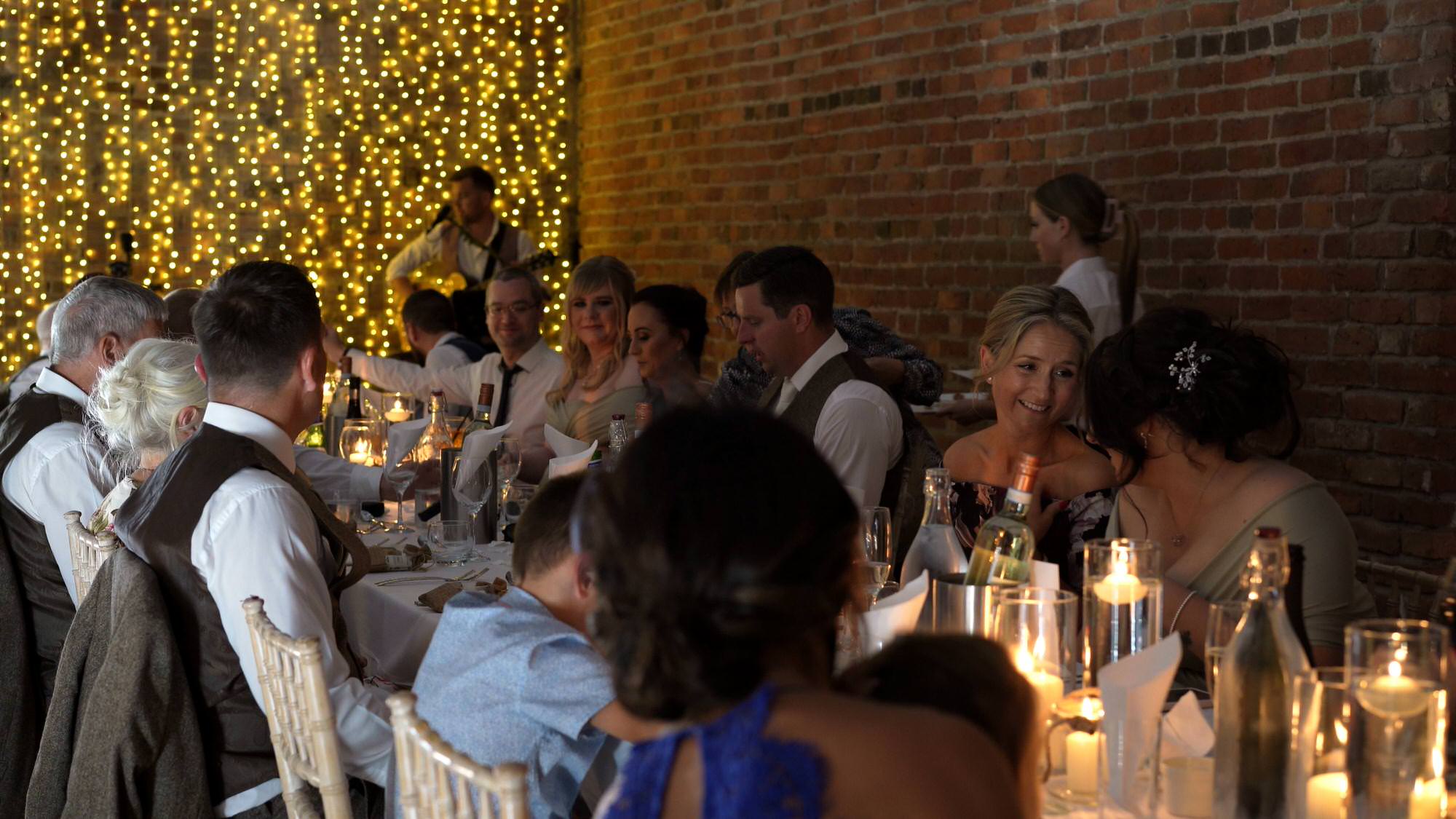 an intimate wedding breakfast on the mezzanine at the barn at morleys hall