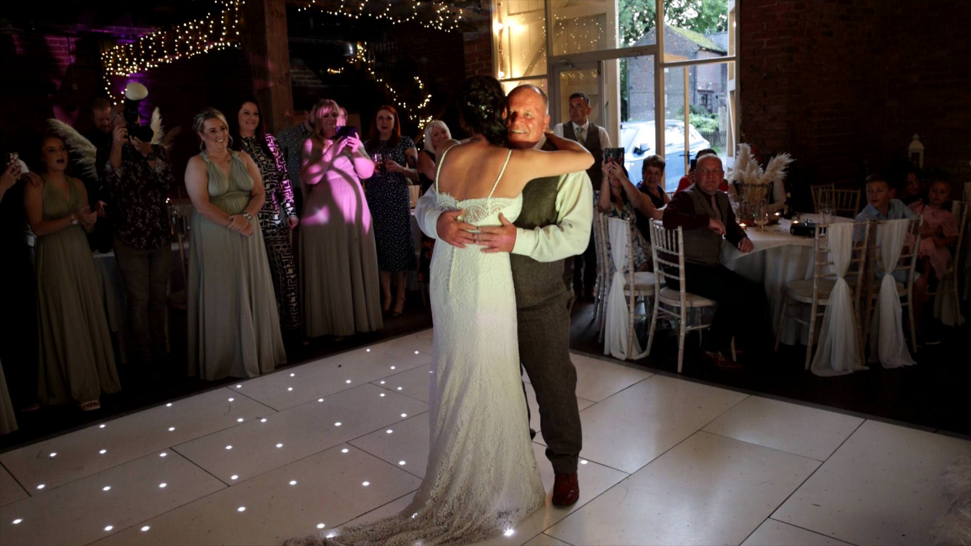 father and daughter dance at the barn at morleys hall Manchester