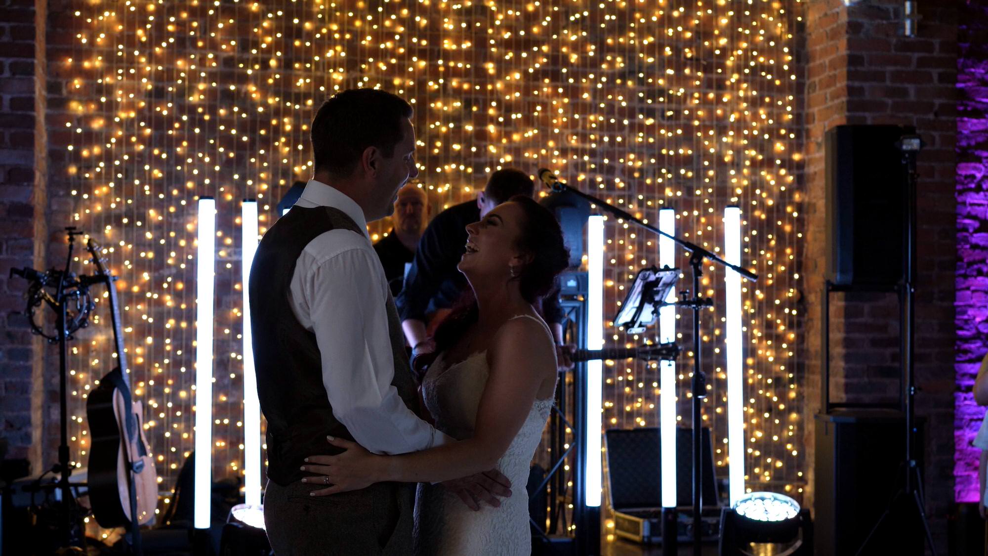 alex birtwell sings during first dance at the barn at morleys hall