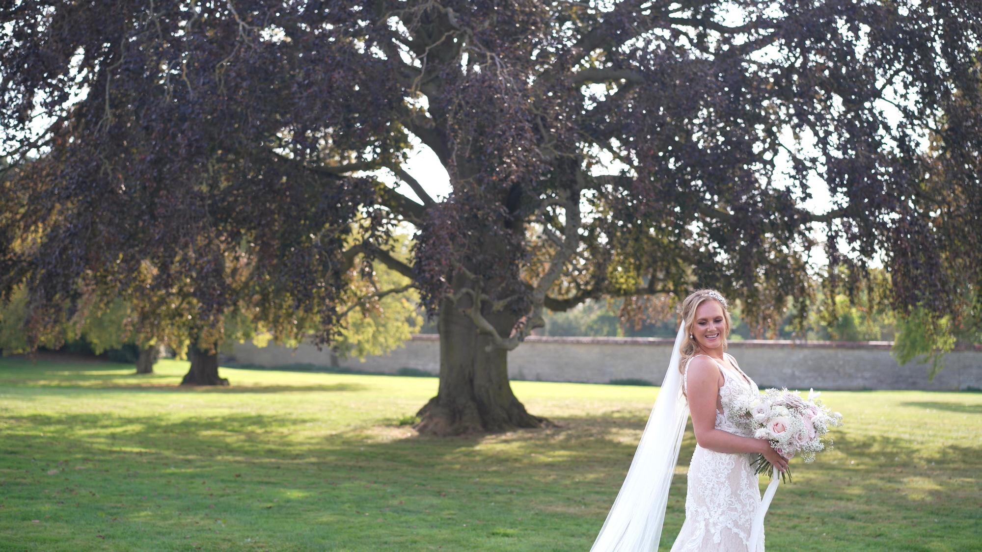 a natural moment of the bride waiting for photos at Stubton Hall Newark