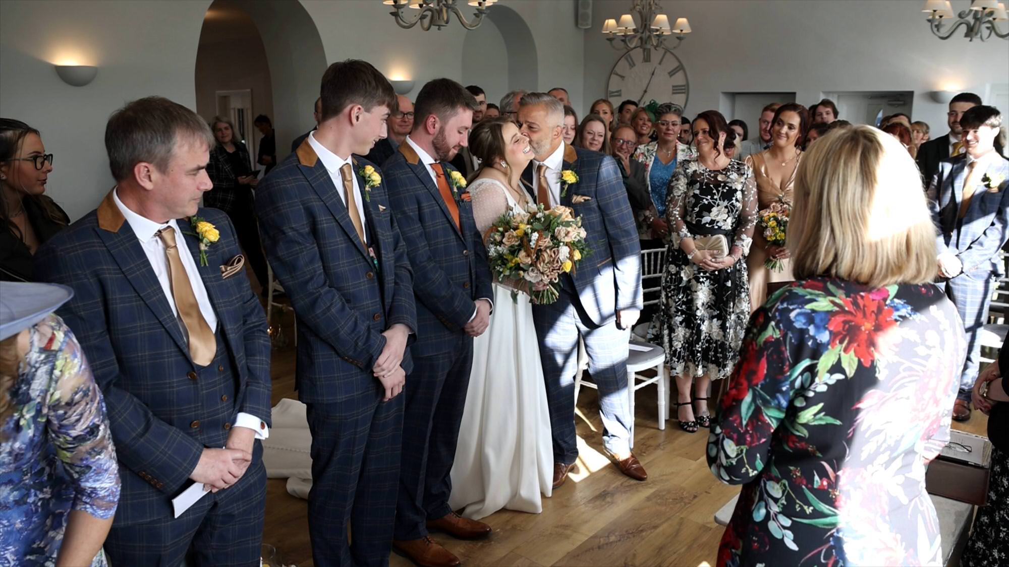 a wide shot of the wedding ceremony in Cartmel Old Grammar