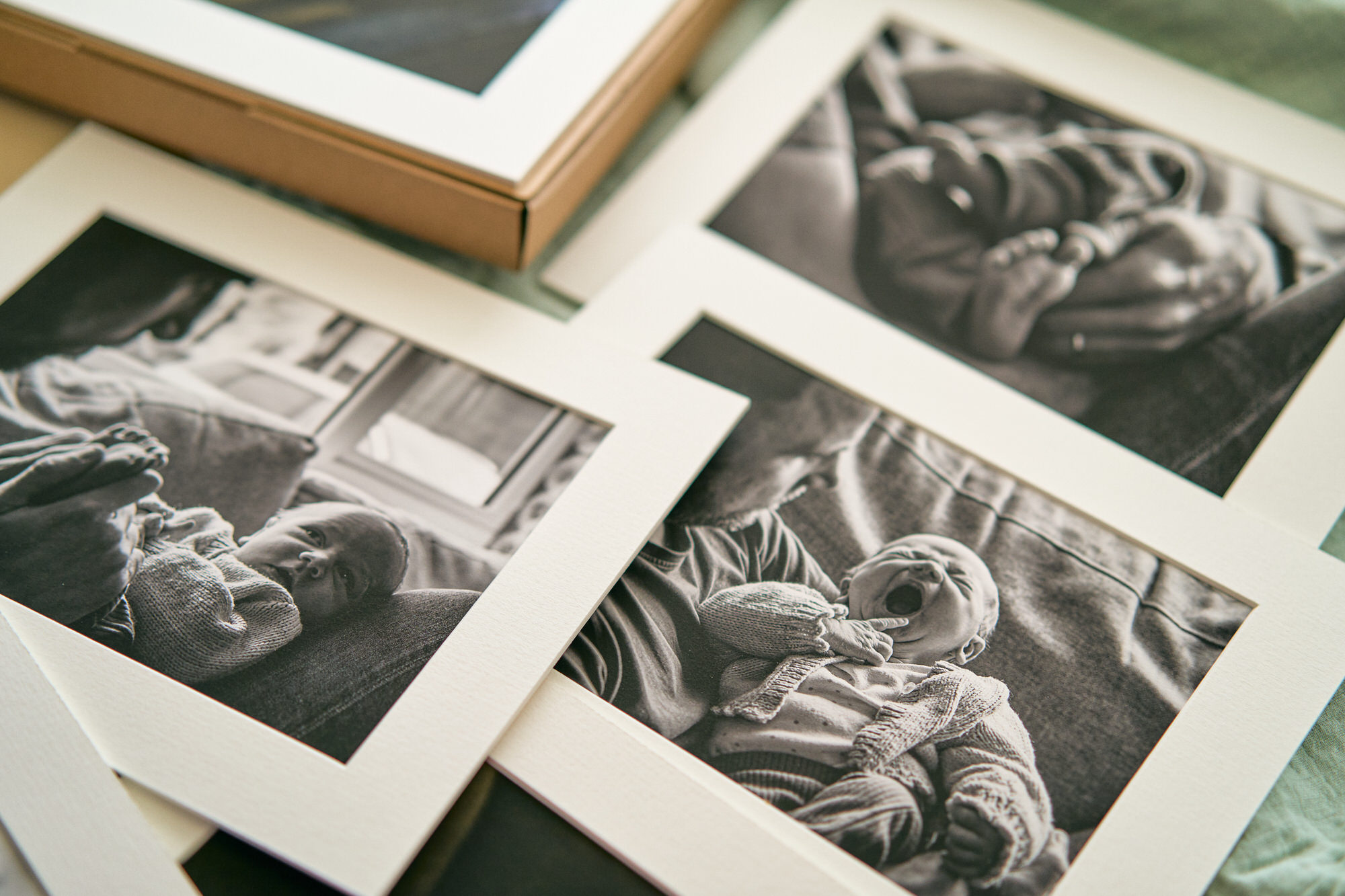 a collection of fine art family prints for a newborn photo shoot