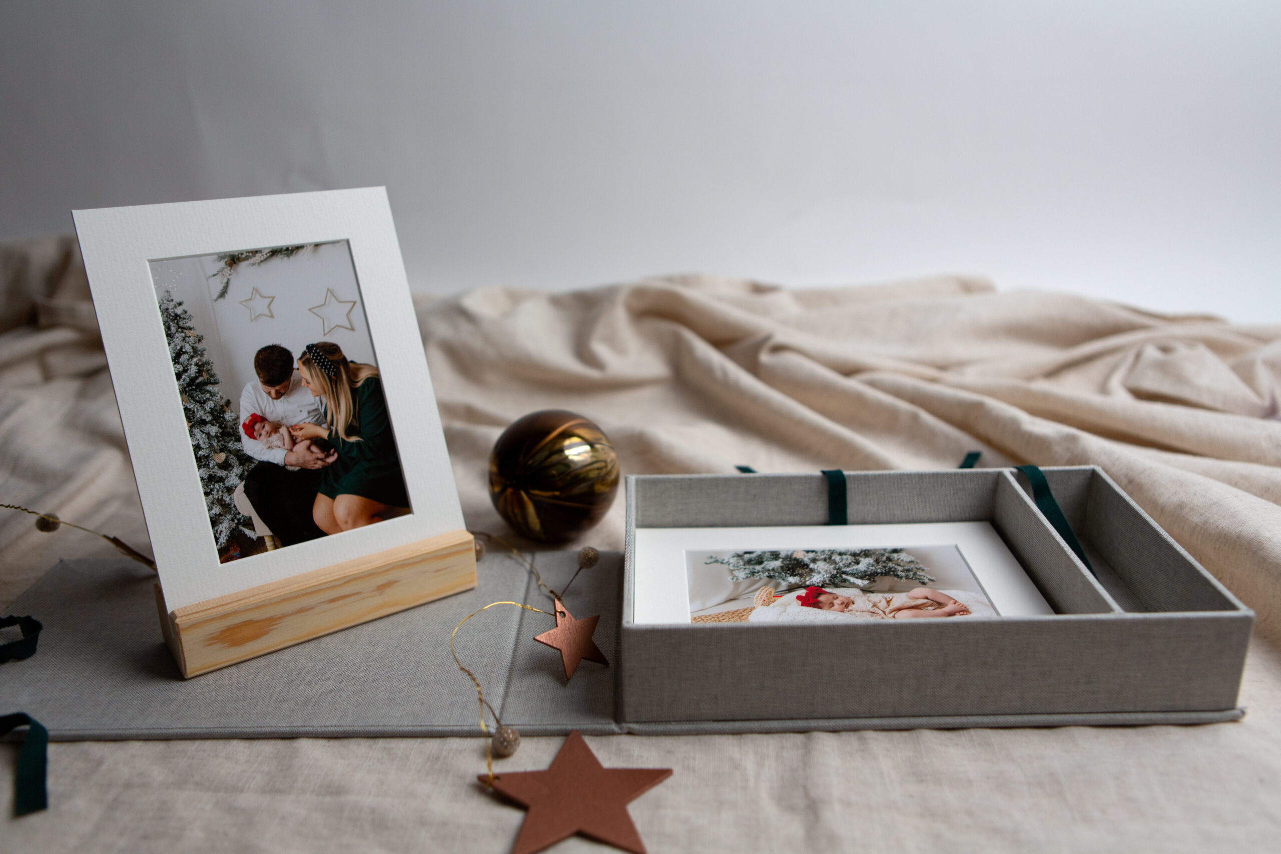 family photoshoot gift box and stand displayed for christmas