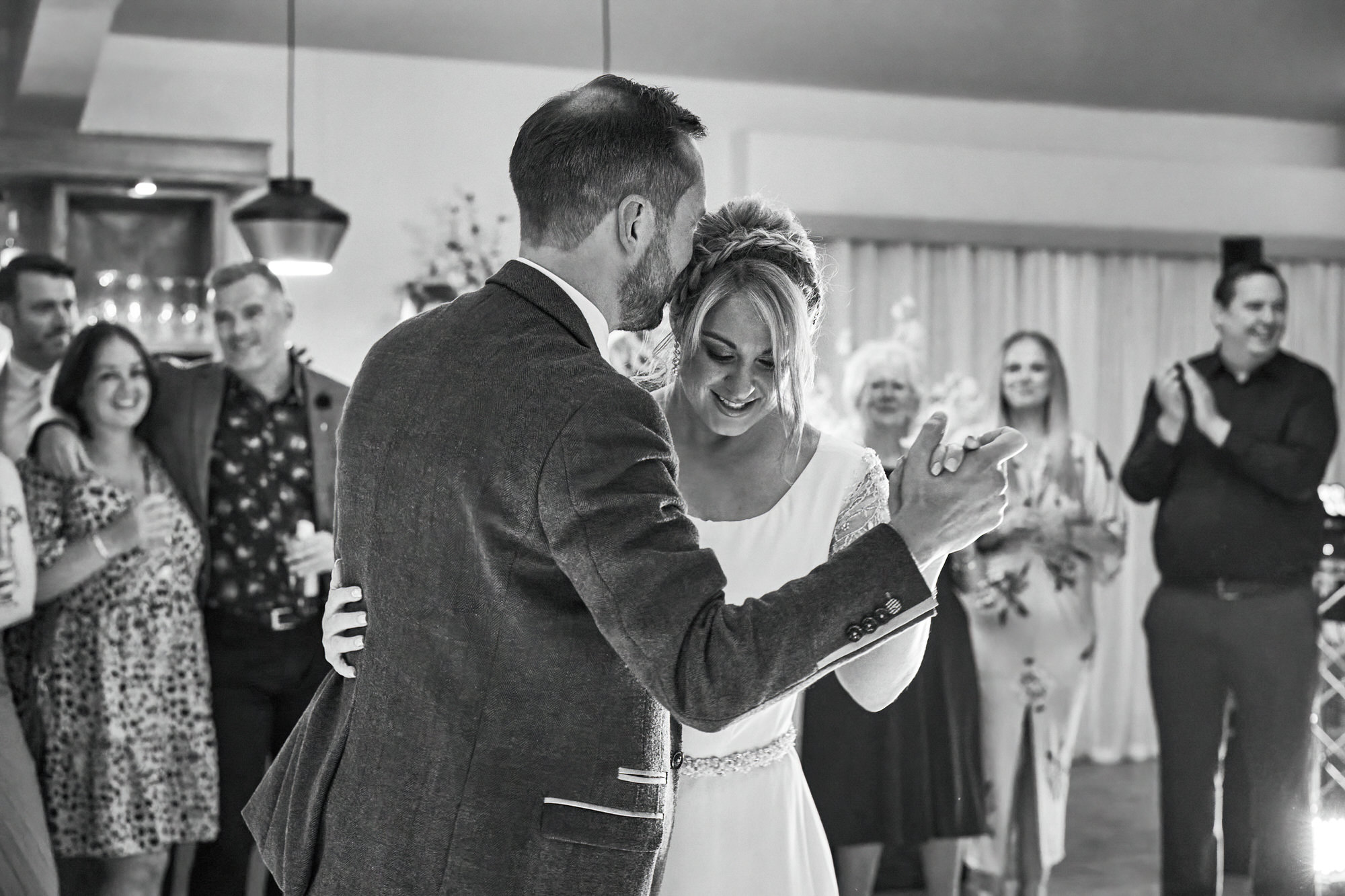 a black and white candid photo of a first dance at The Aviary Ormskirk