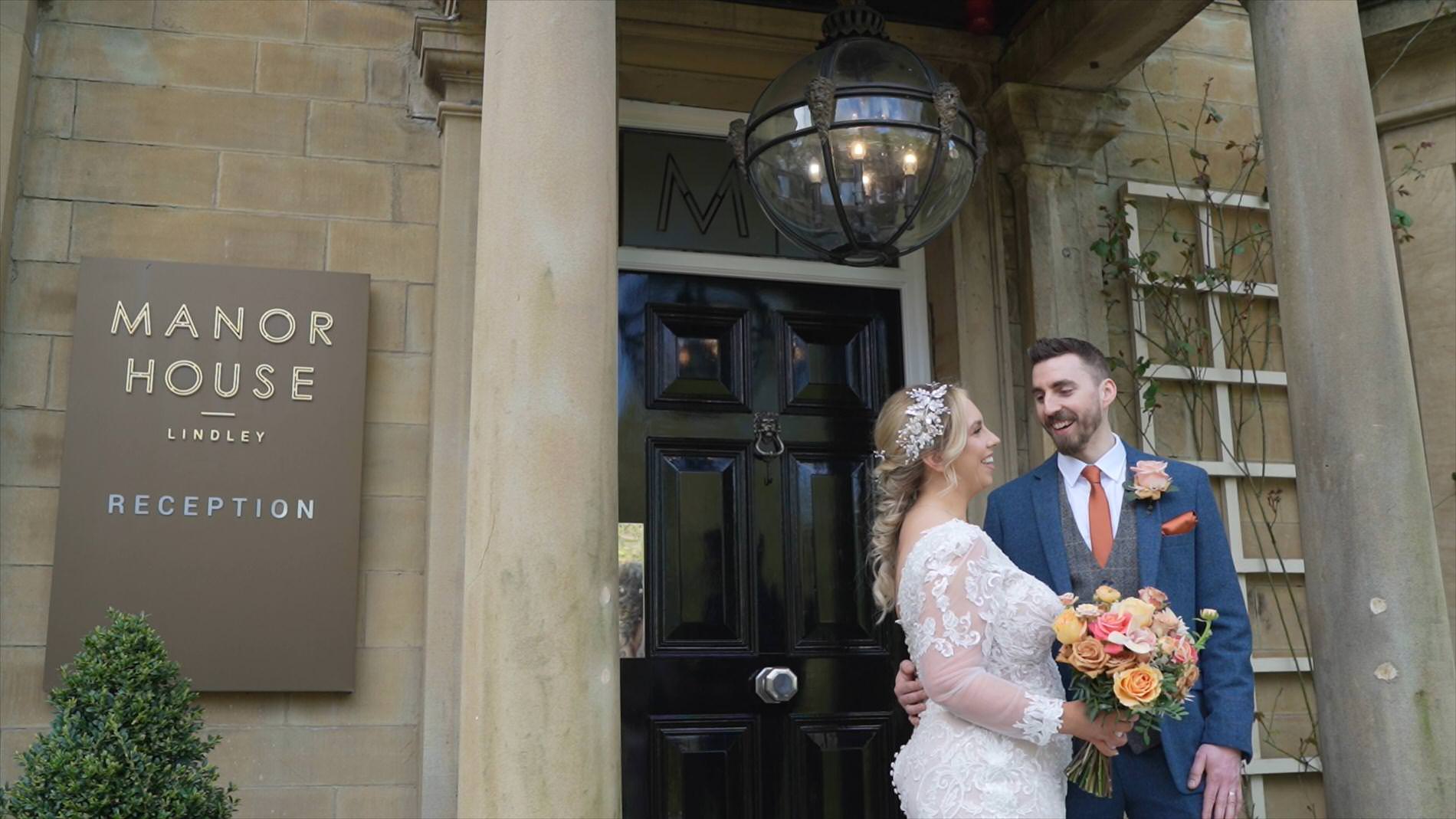 a video still of the couple laughing in the doorway of Manor House Lindley