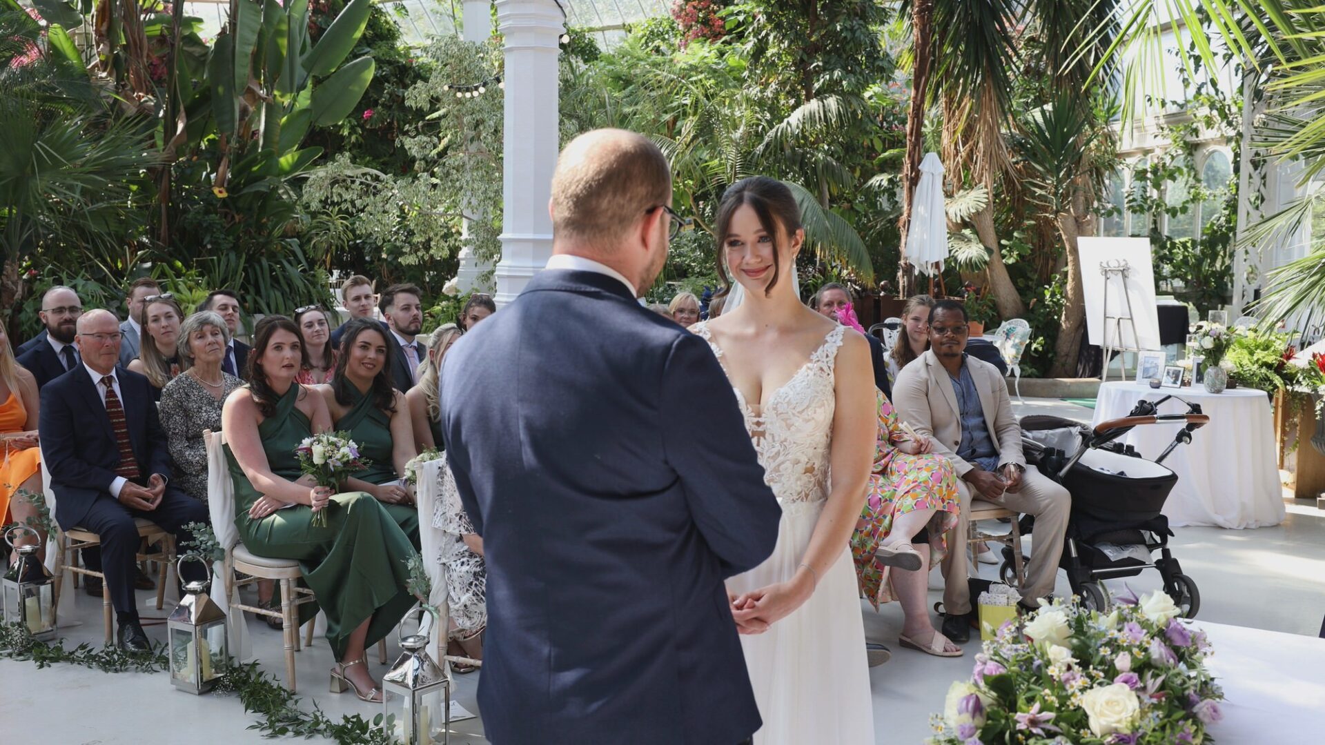 a couple say their vows during a Sefton Park Palm House wedding ceremony