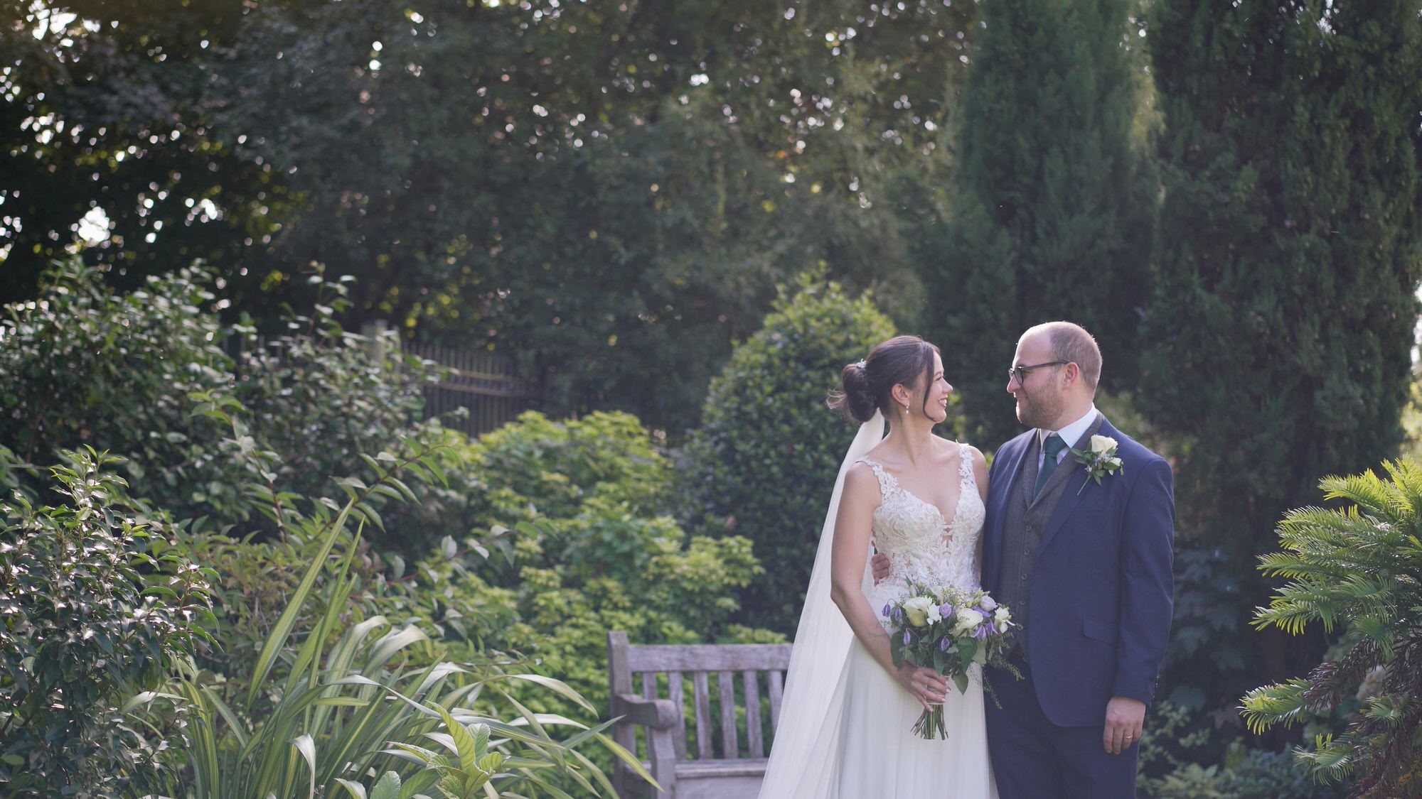 Kirsty and Josh Sefton Palm House Wedding Video 23 a wide shot of guests mingling during reception at Sefton Park Palm House