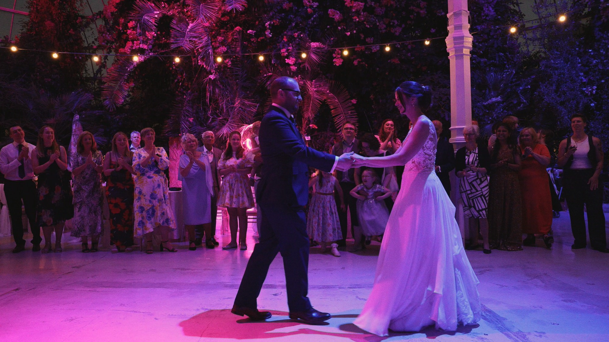 Kirsty and Josh Sefton Palm House Wedding Video 38 a wide video shot of a couples choreographed first dance at Sefton Park Palm House Liverpool