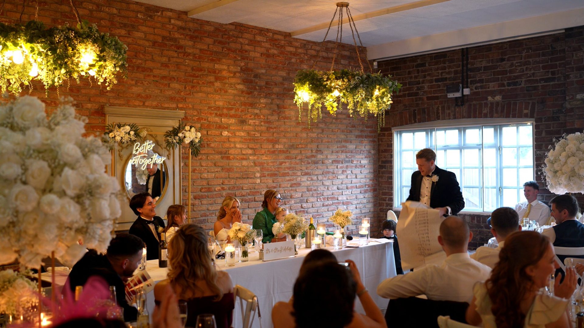 a wide video shot of a funny best man speech with props at Larkspur Lodge in Cheshire