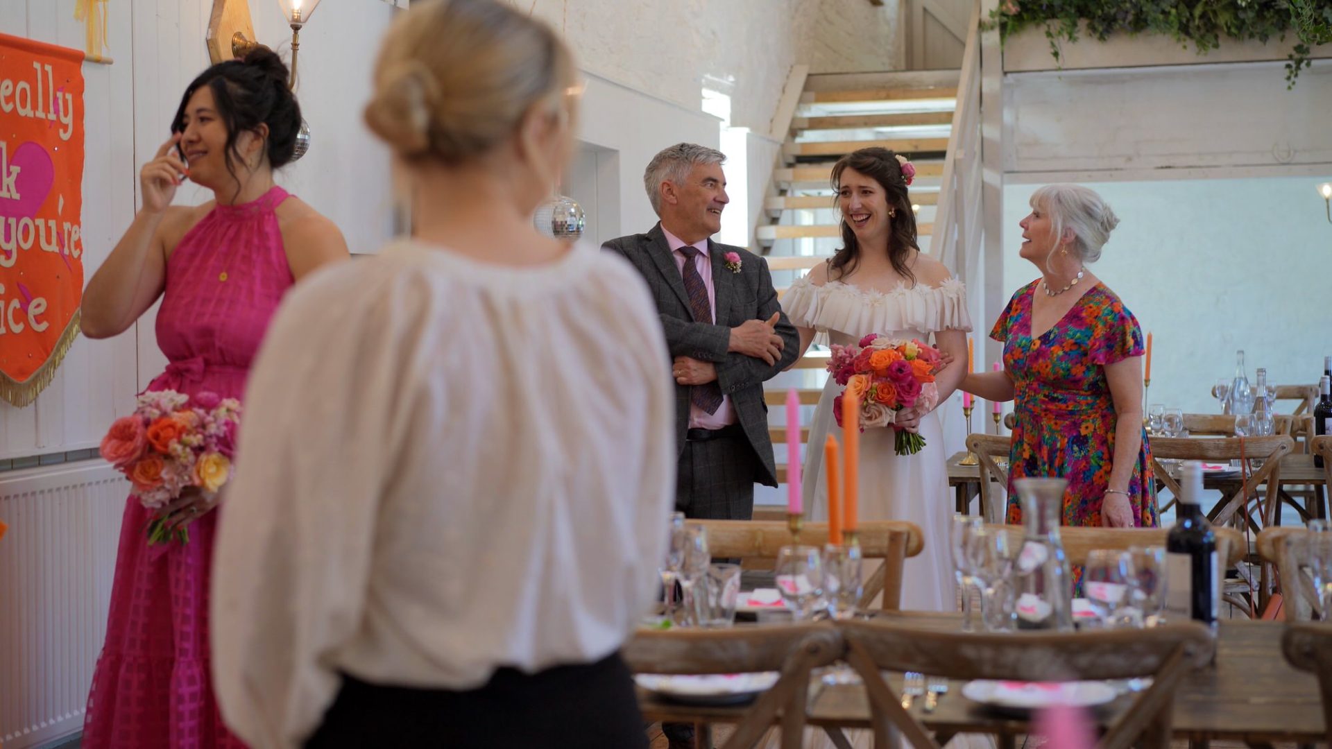 a bride and her Parents take a moment before walking down the aisle at Wyresdale Park