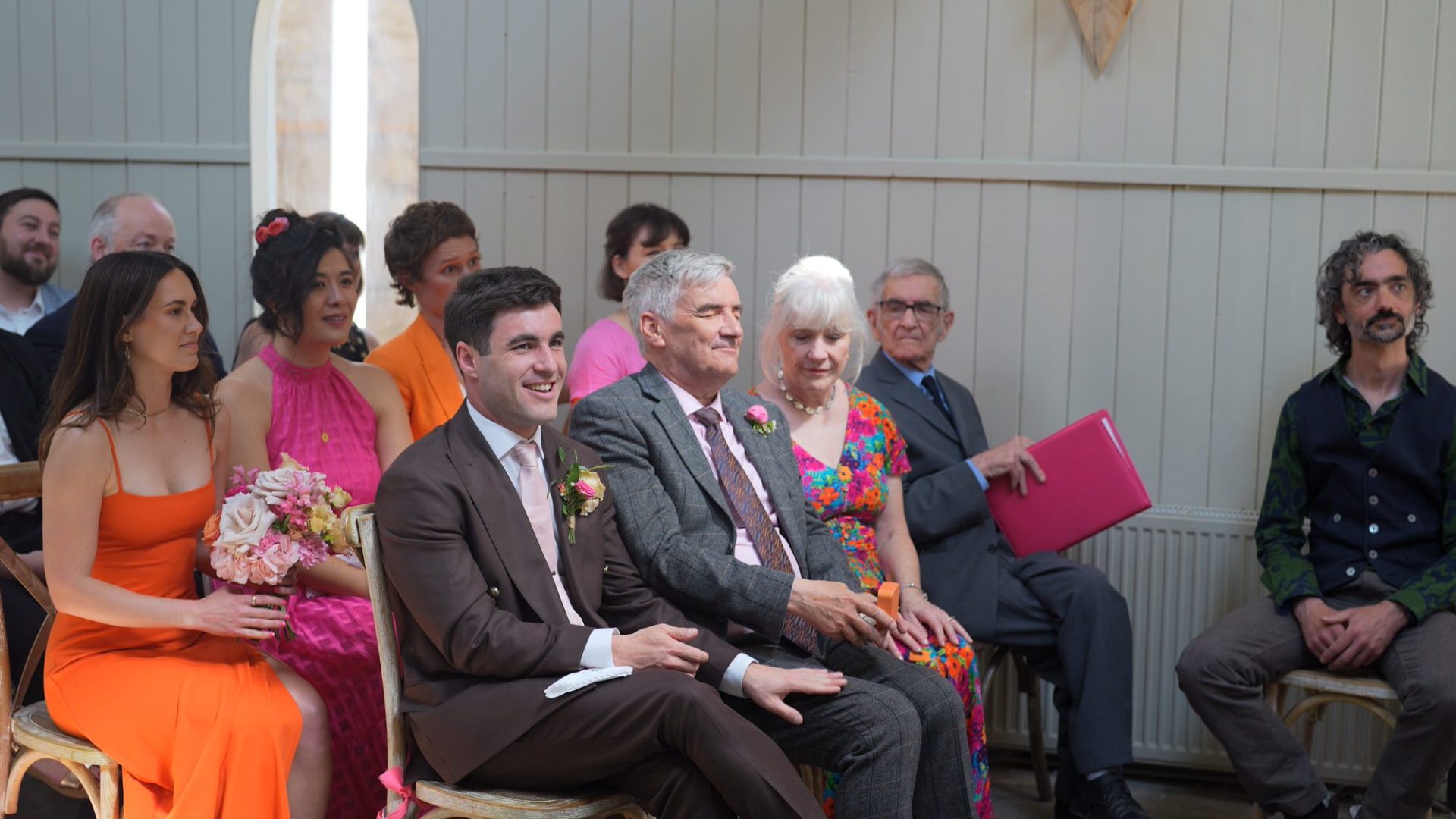 guests bless the wedding rings during celebrant led wedding at Wyresdale Park