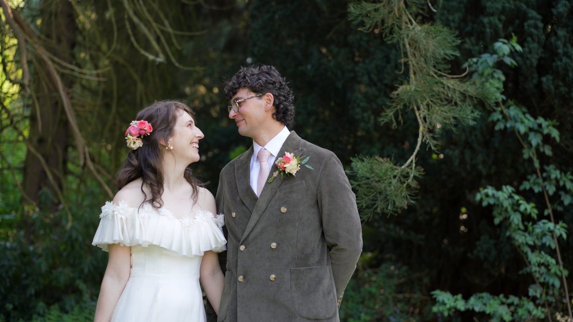 a relaxed video still of a couple in the gardens at Wyresdale Park