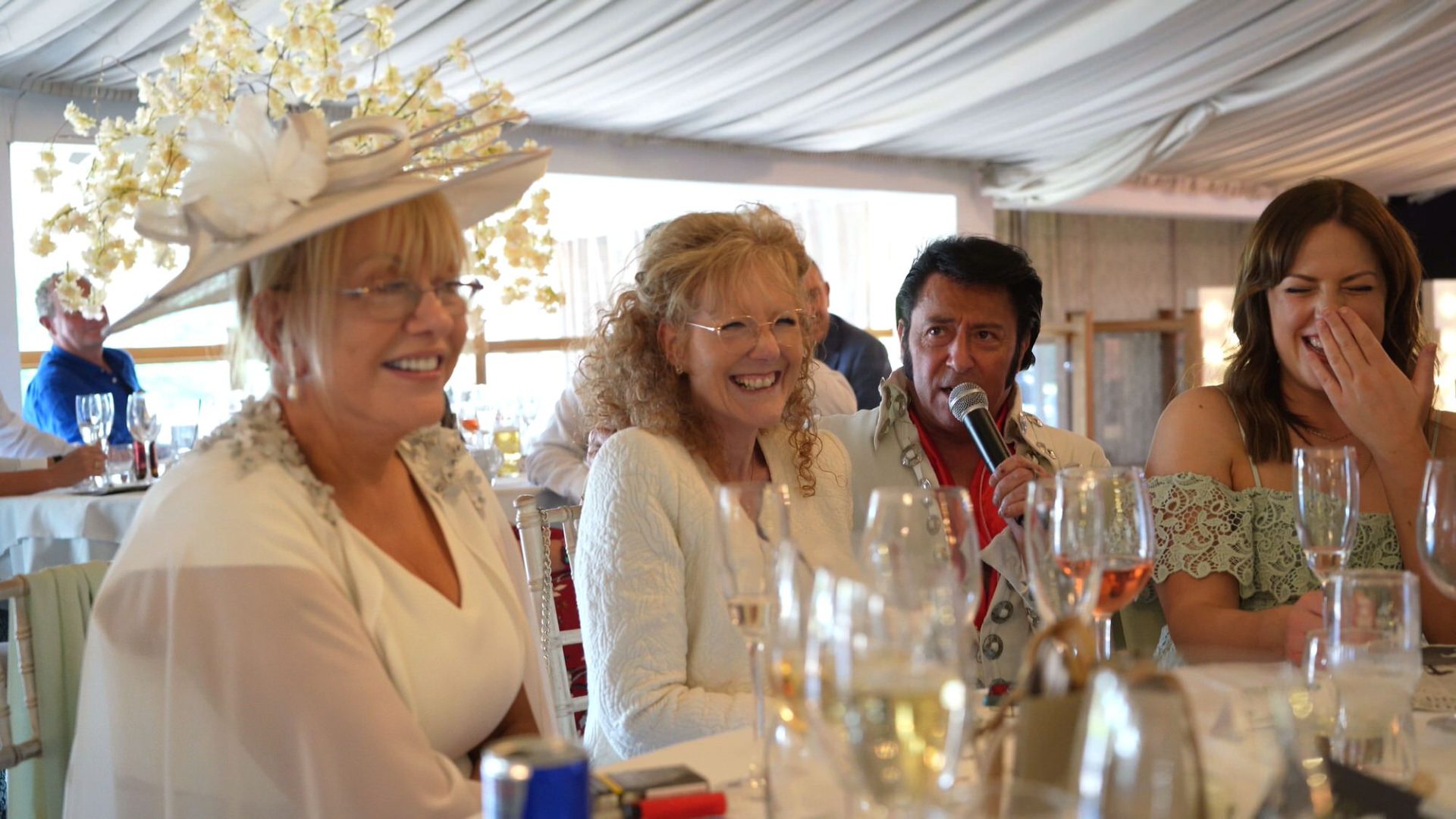 guests laugh with Elvis during a wedding