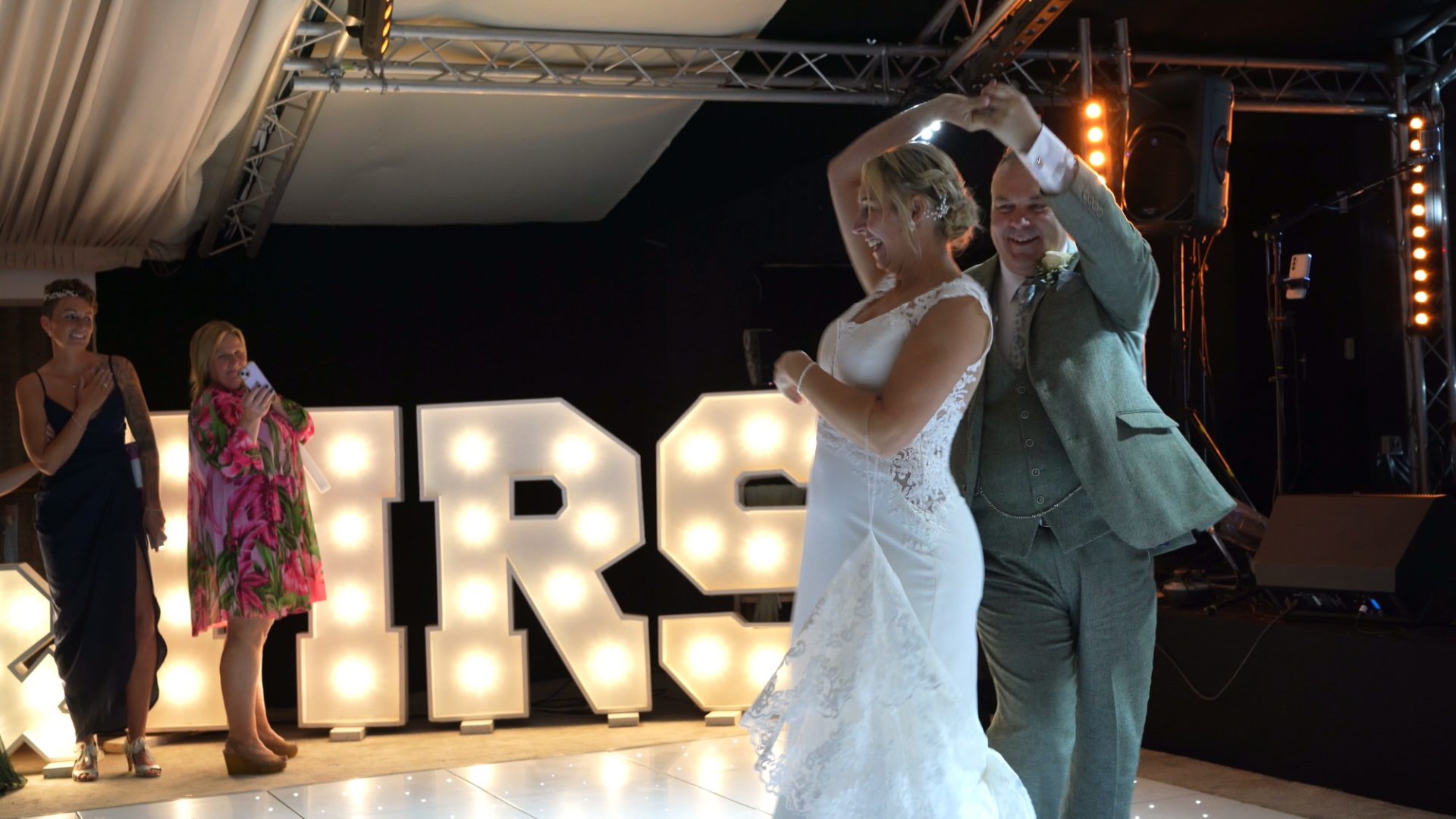 the couple dance to Elvis at a marquee wedding in Yorkshire