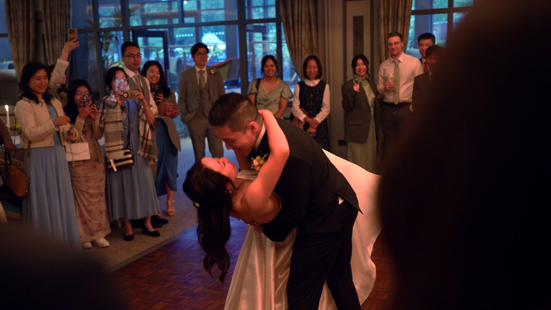 a couple perform a choreographed first dance at Lodore Falls