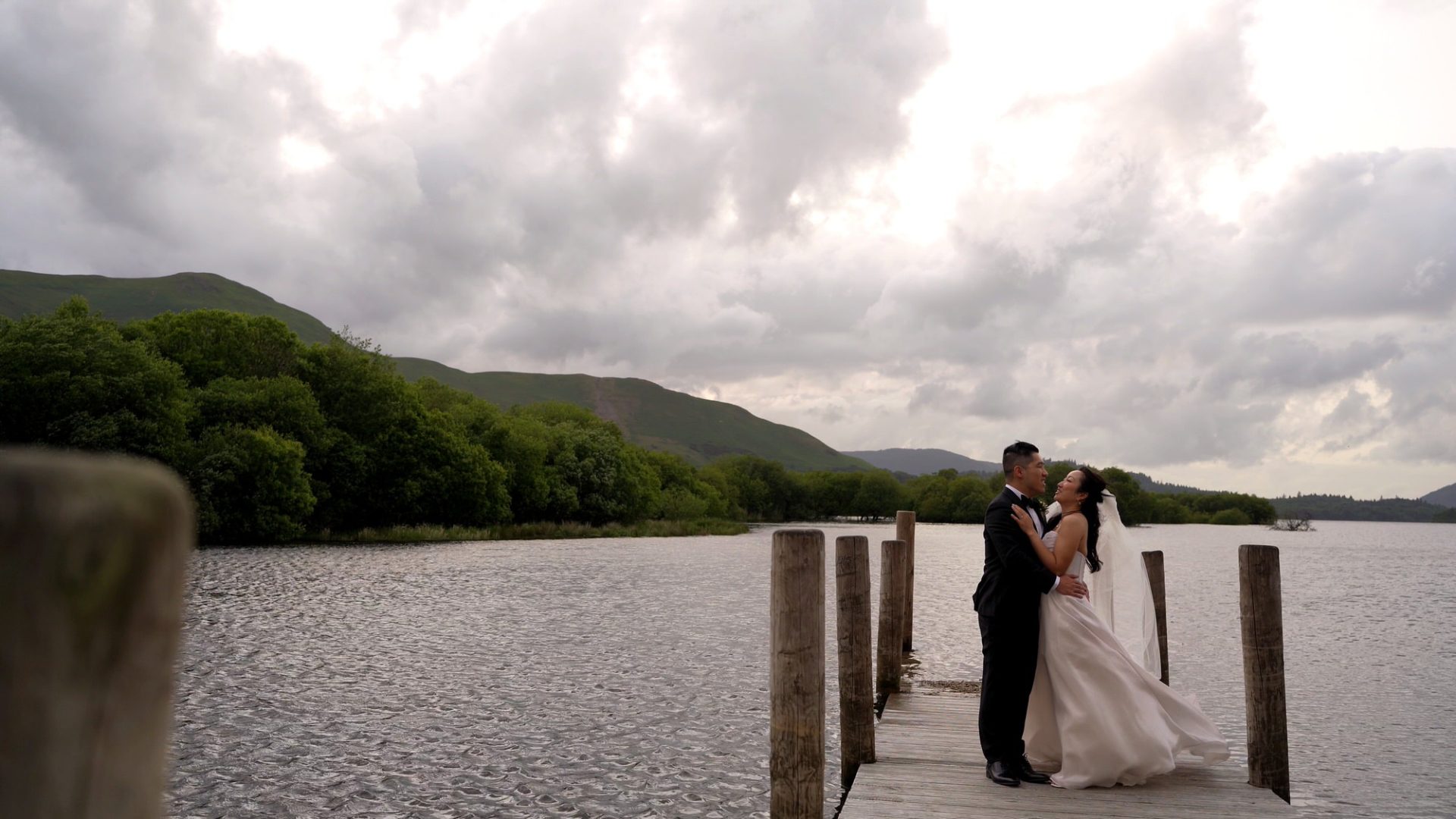 a wide video shot of a couple of the jetty by Lodore Falls Hotel in Borrowdale