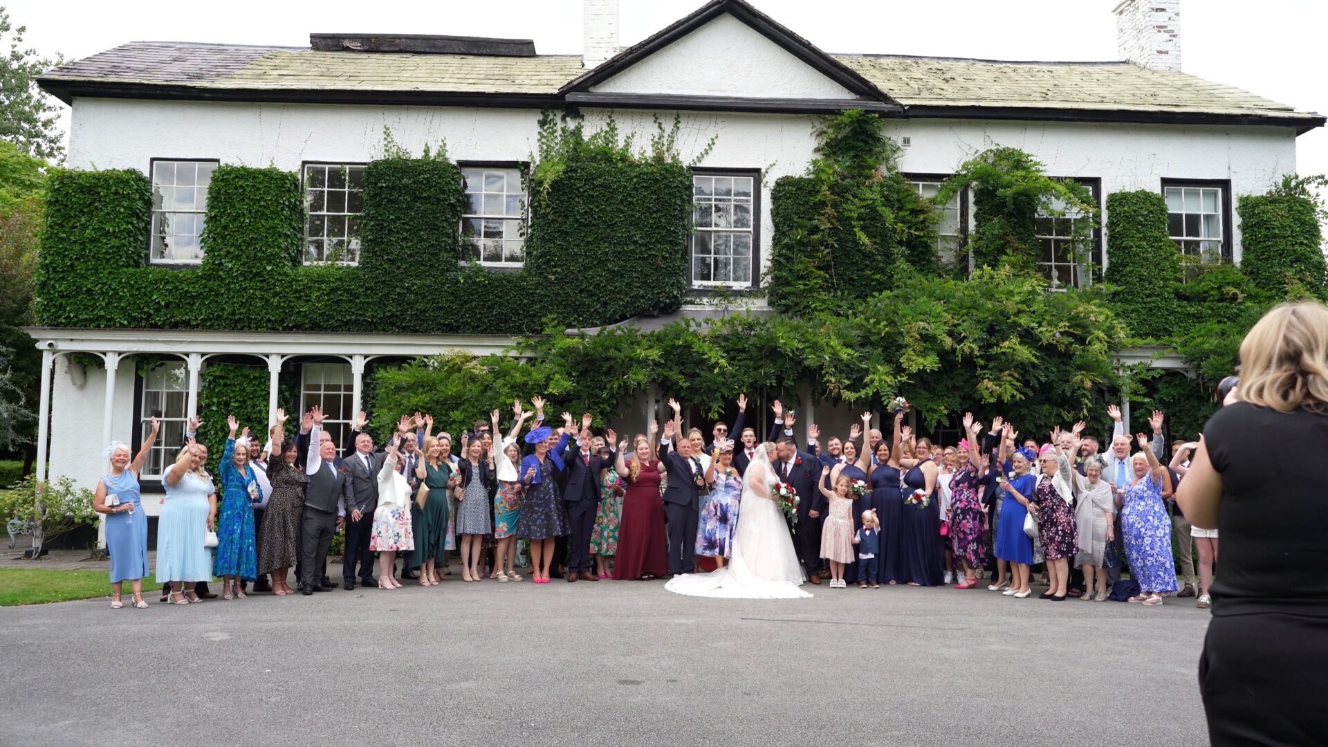 guests gather for the big group shot outside Statham Lodge Hotel in warrington