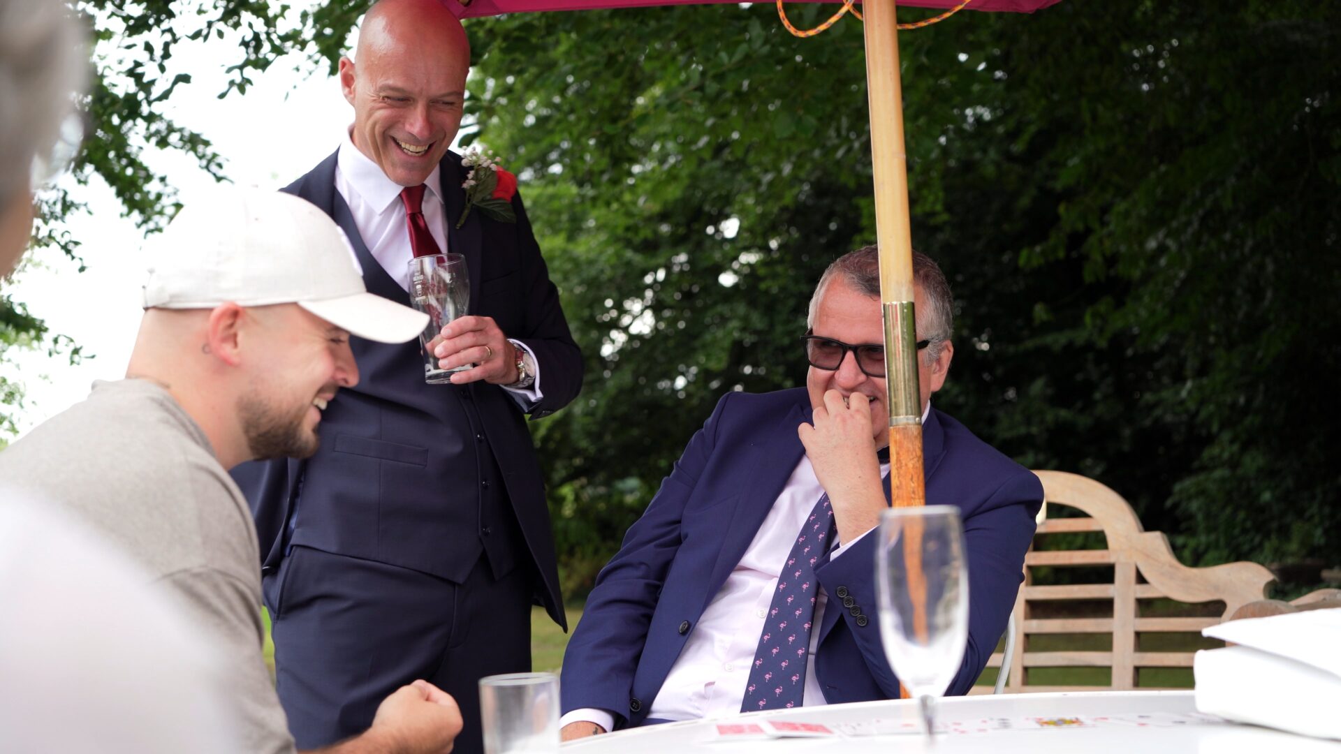 guests laugh at a magic trick