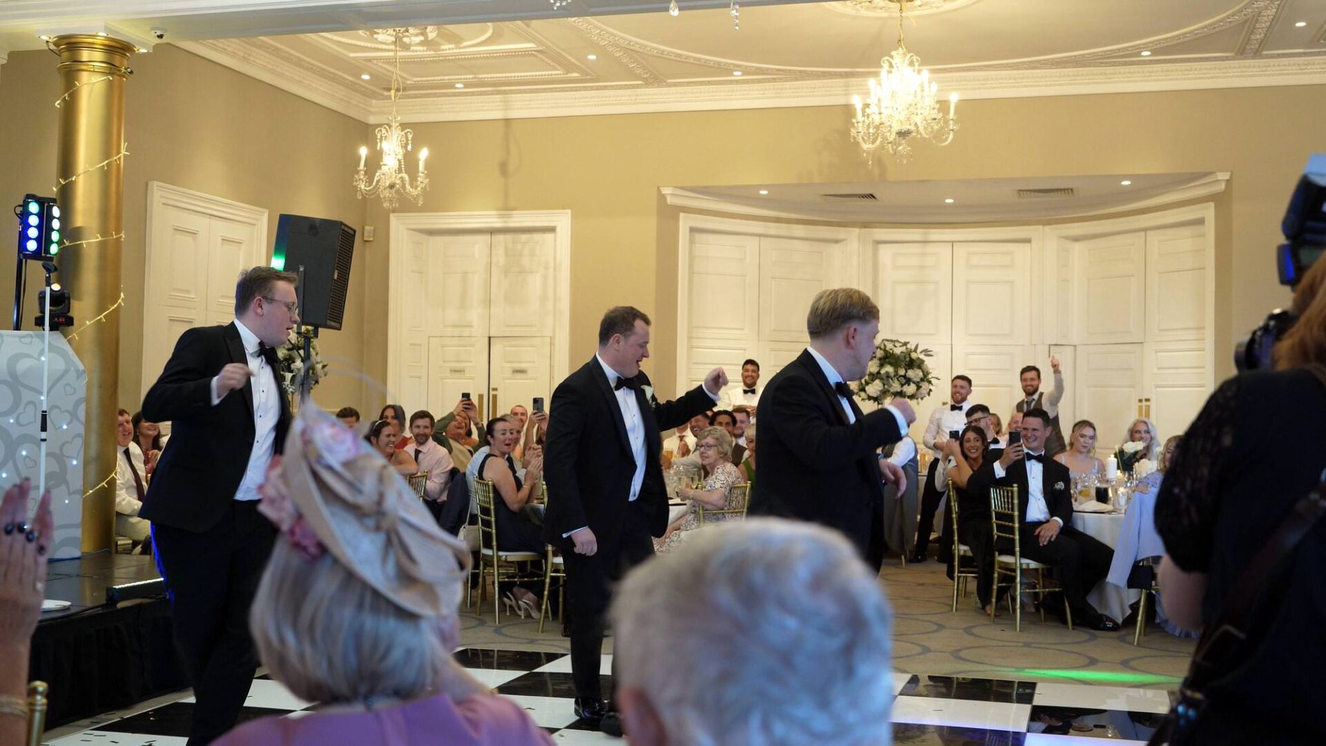 videographer captures surprise House of Bamboo dance by Groom and Best Men