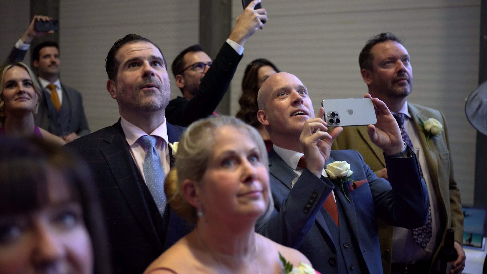 guests gaze at the nose drop surprise during wedding at Concorde