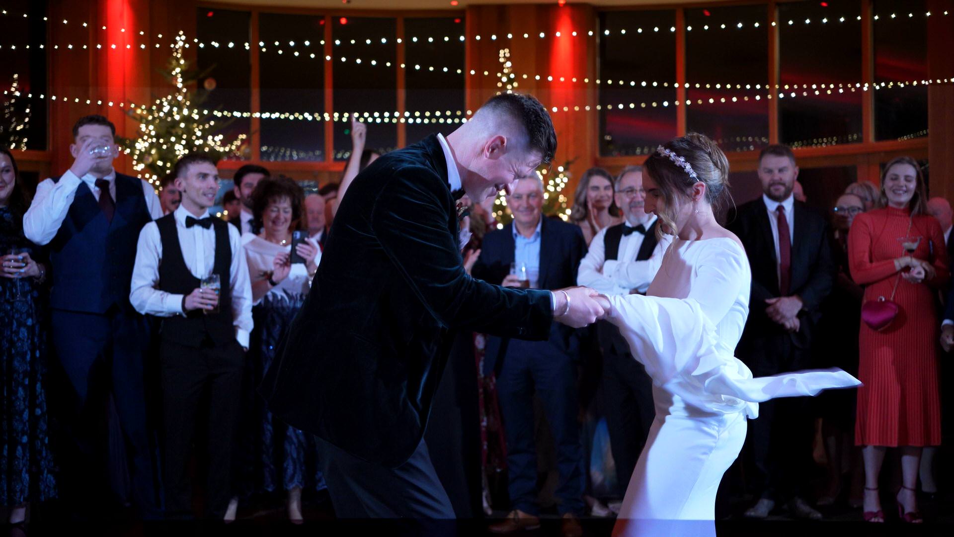 the couple enjoy their fun first dance at the Out Barn