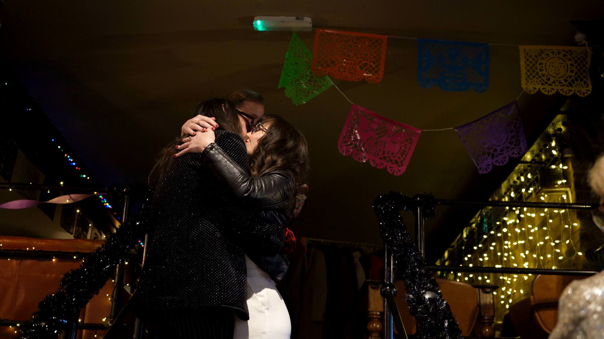 the couple caught on video sealing it with a kiss at The Depot