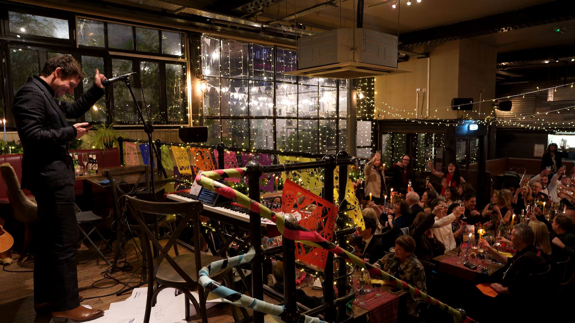 the best main raises a toast to the couple during a Depot N7 Wedding reception