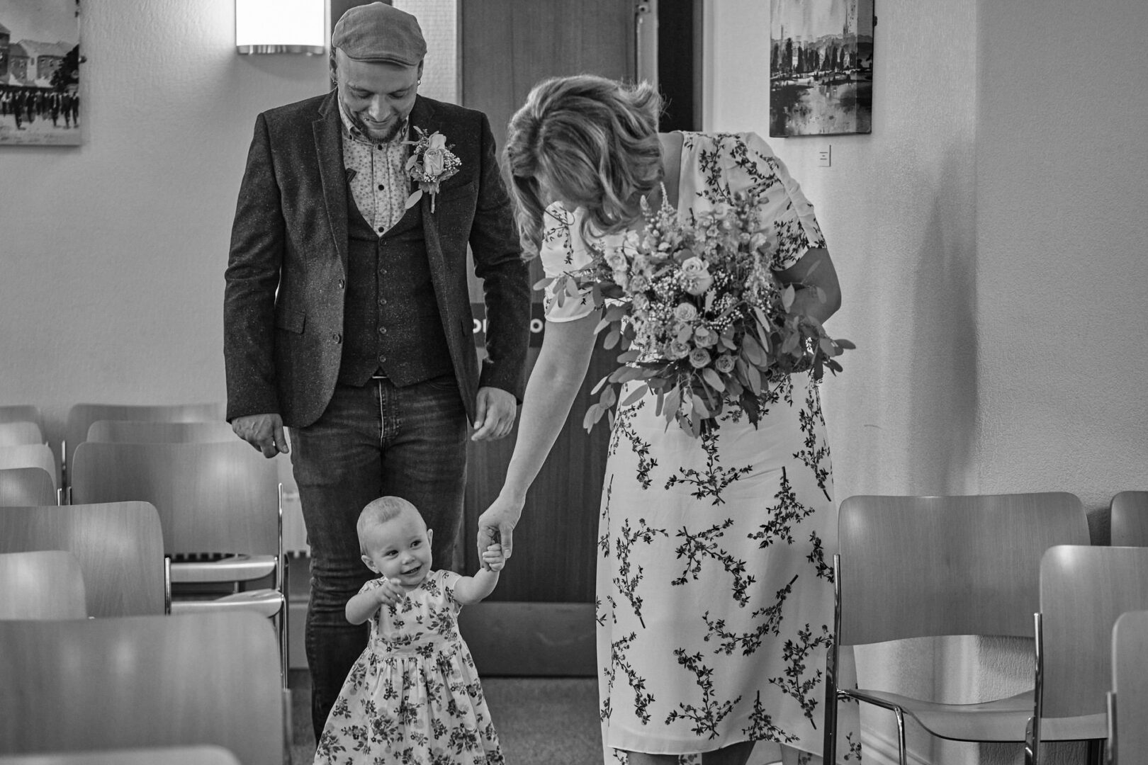a toddler takes he first steps down the aisle at Ormskirk registry office