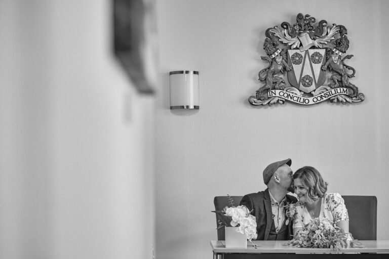 a candid unposed moment during signing at Ormskirk registry office
