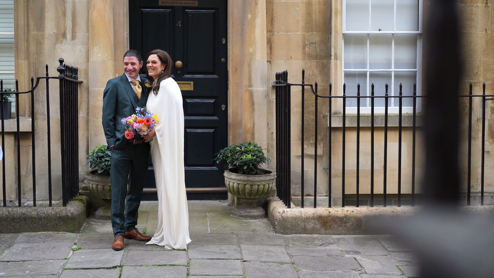 a relaxed couple shot outside Bridgeton House