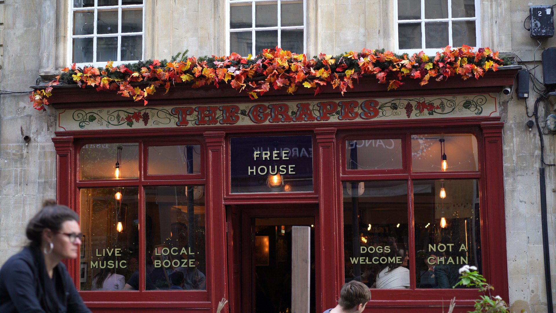 couple sit in a pub before their vow renewal