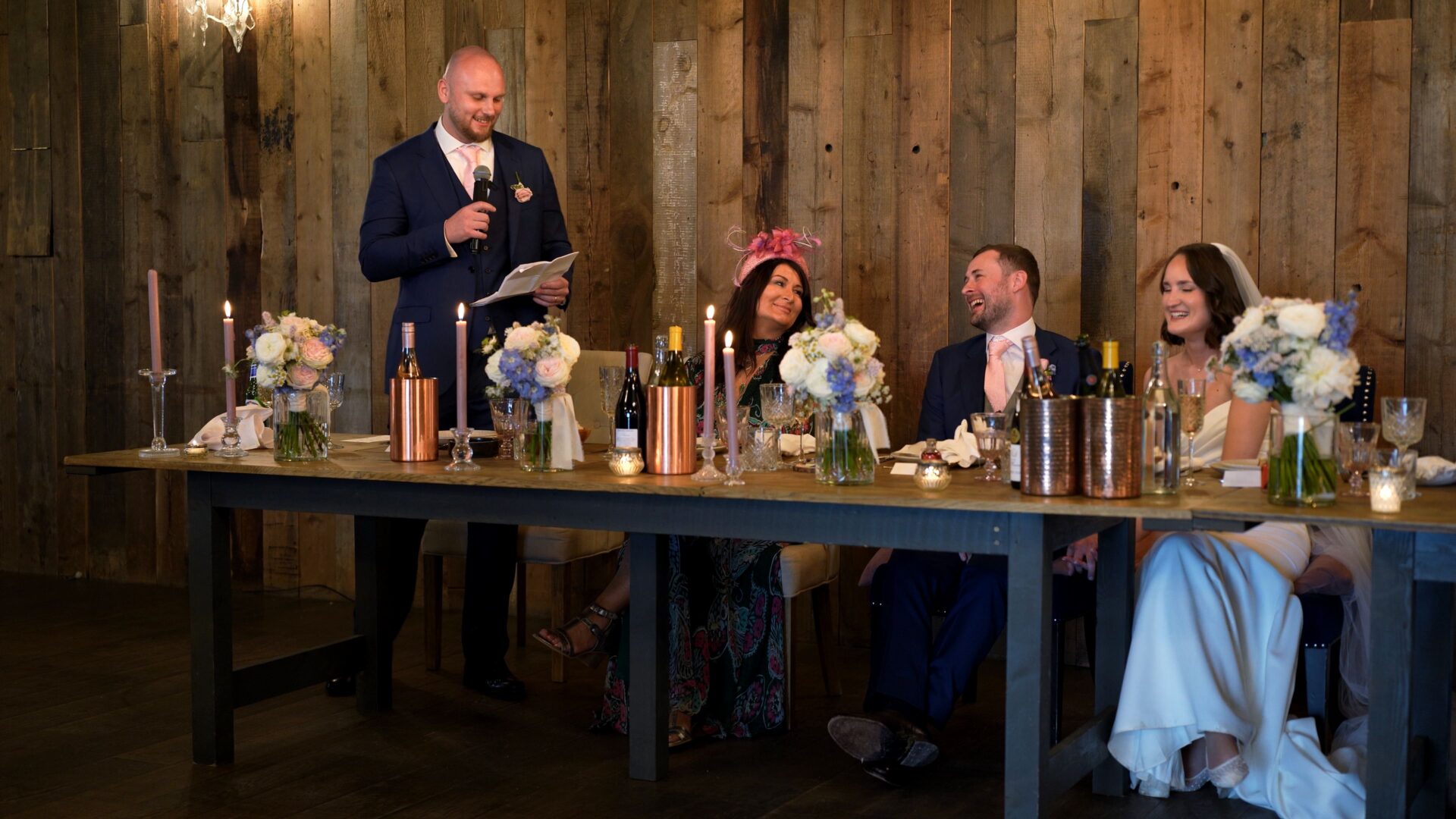 the best man gets the Groom laughing during his wedding speech