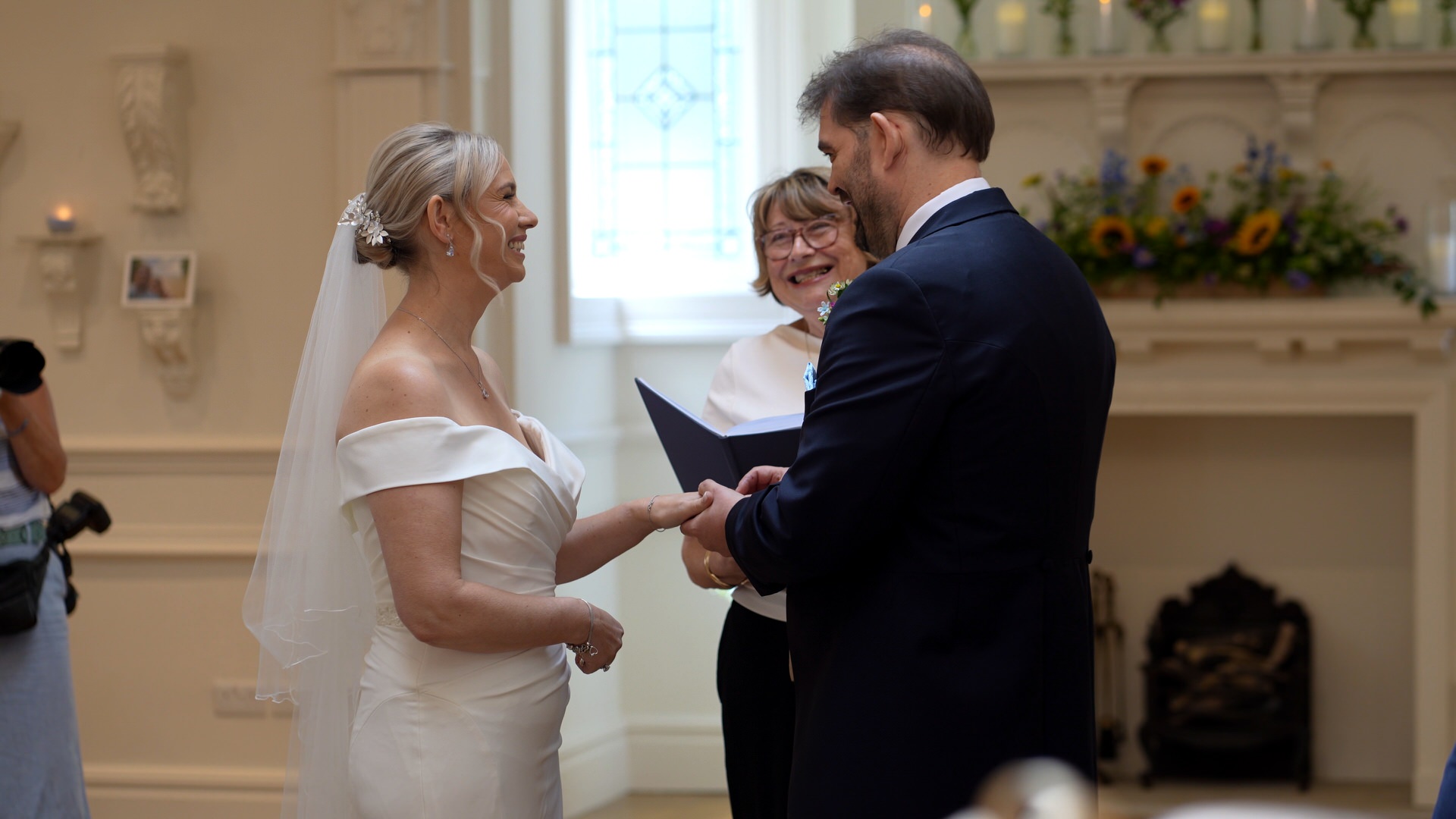 the couple laugh together during their celebrant led wedding ceremony