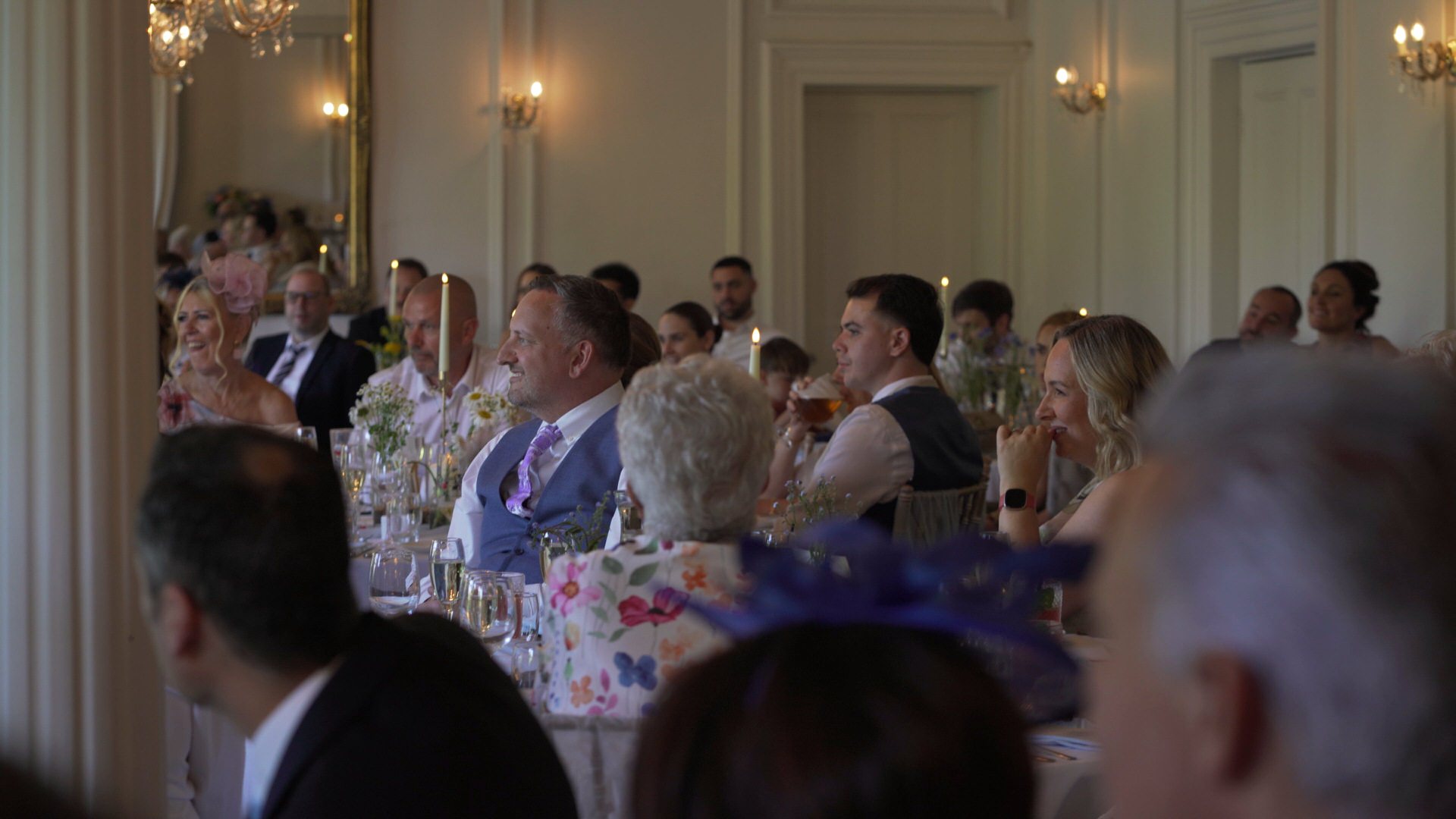 guests laugh during the speeches