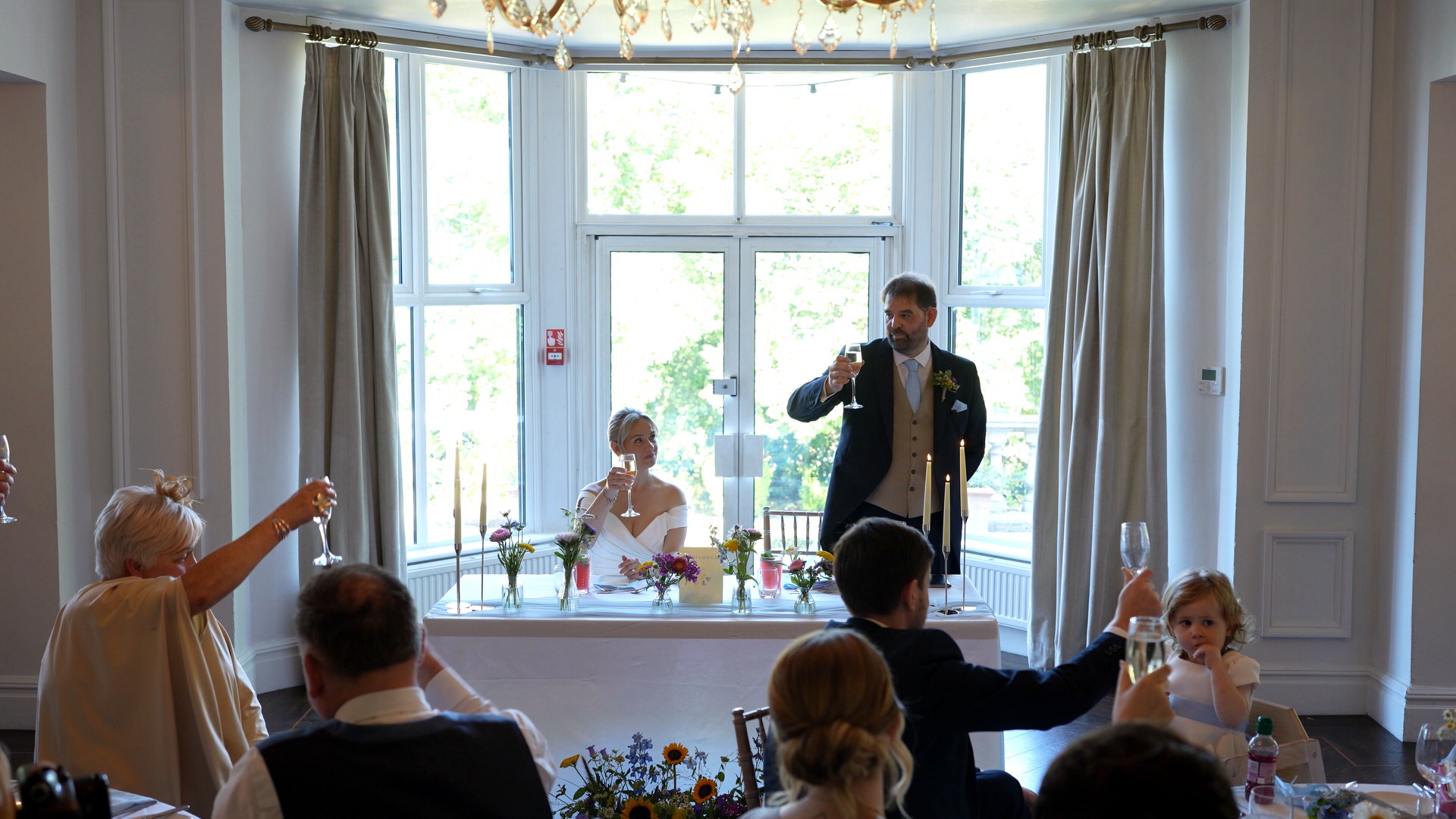 a wide shot of the wedding speeches at Ashfield House where the groom had a mic for clearer audio