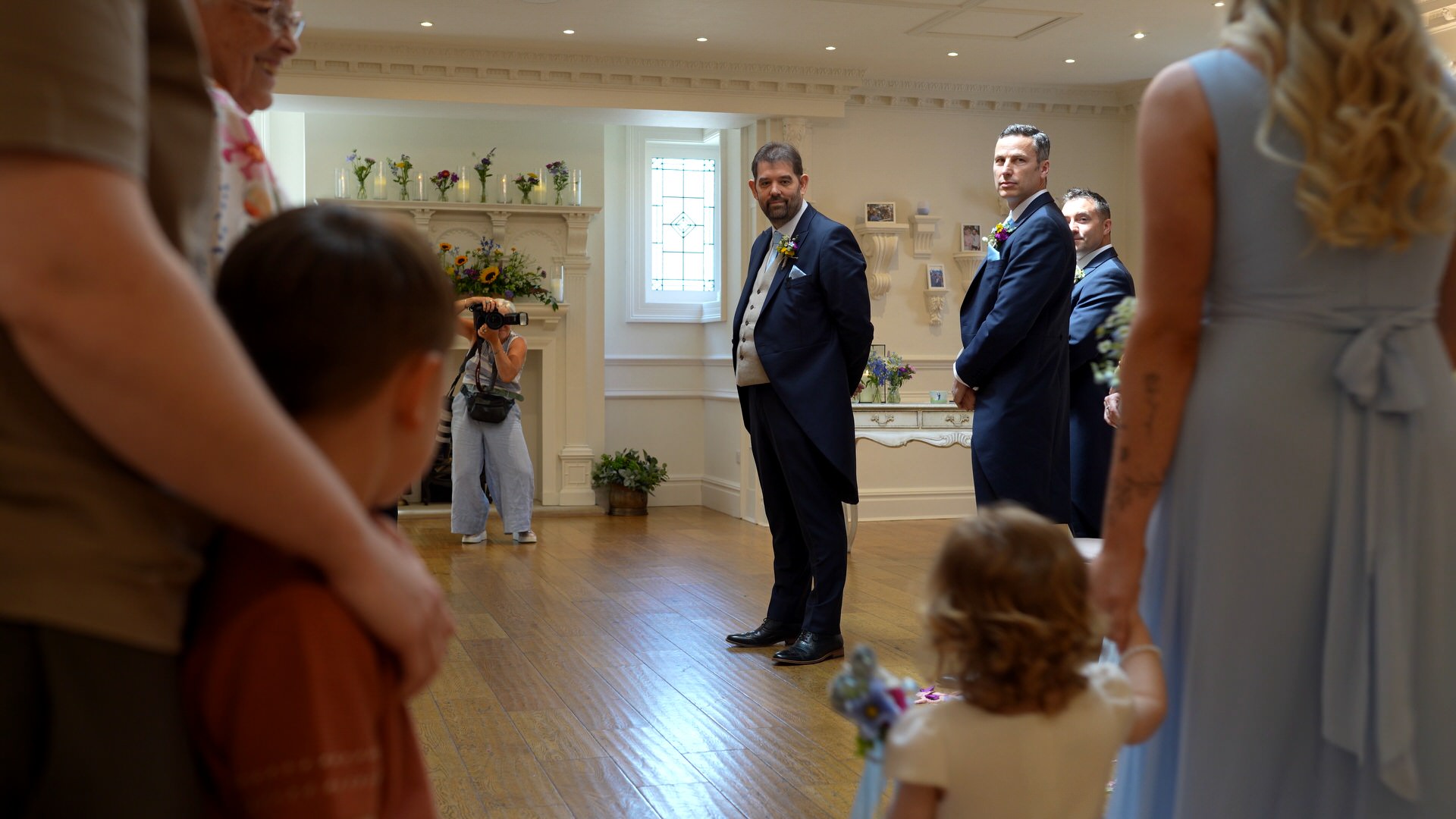 the grooms first look during the wedding ceremony at Ashfield House