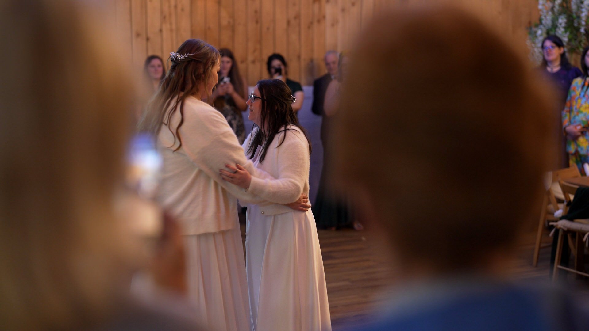 two brides enjoy their first dance at the wellbeing farm in Bolton Lancashire