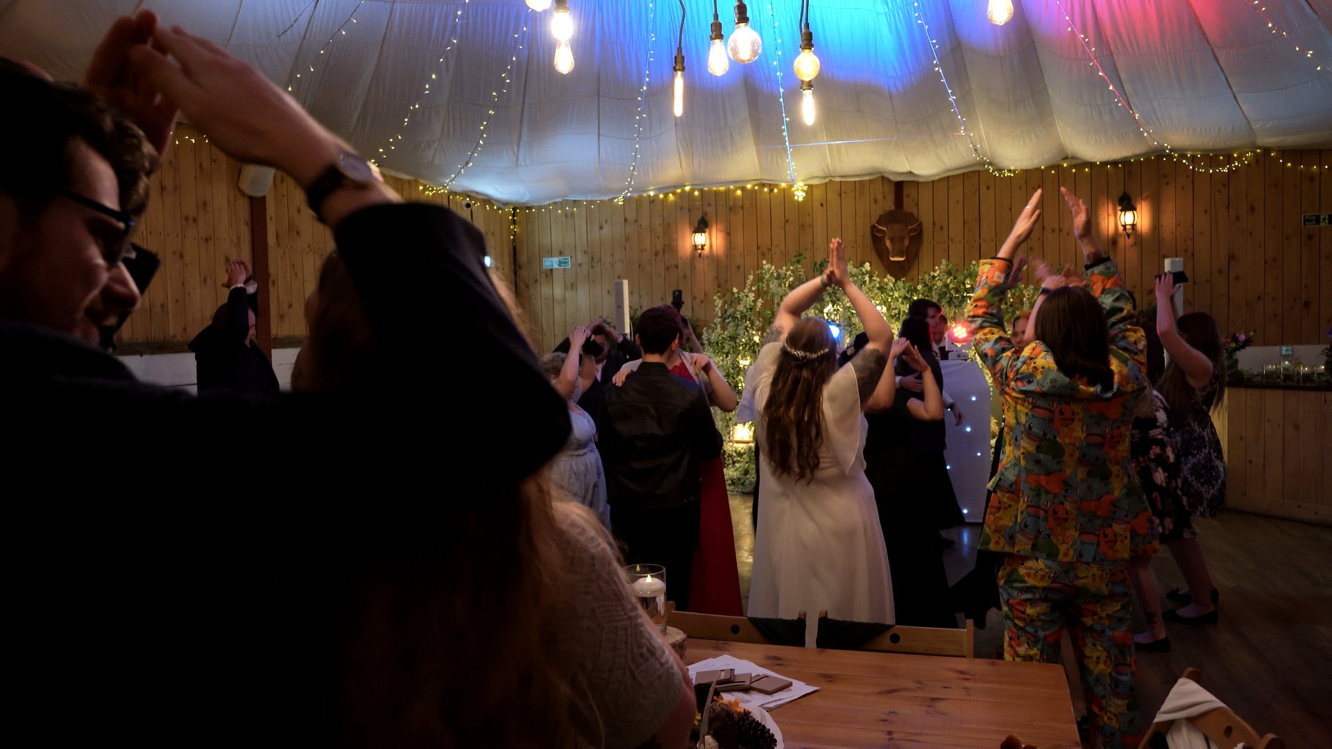 guests hit the floor for the YMCA at this inclusive same sex wedding at the wellbeing farm