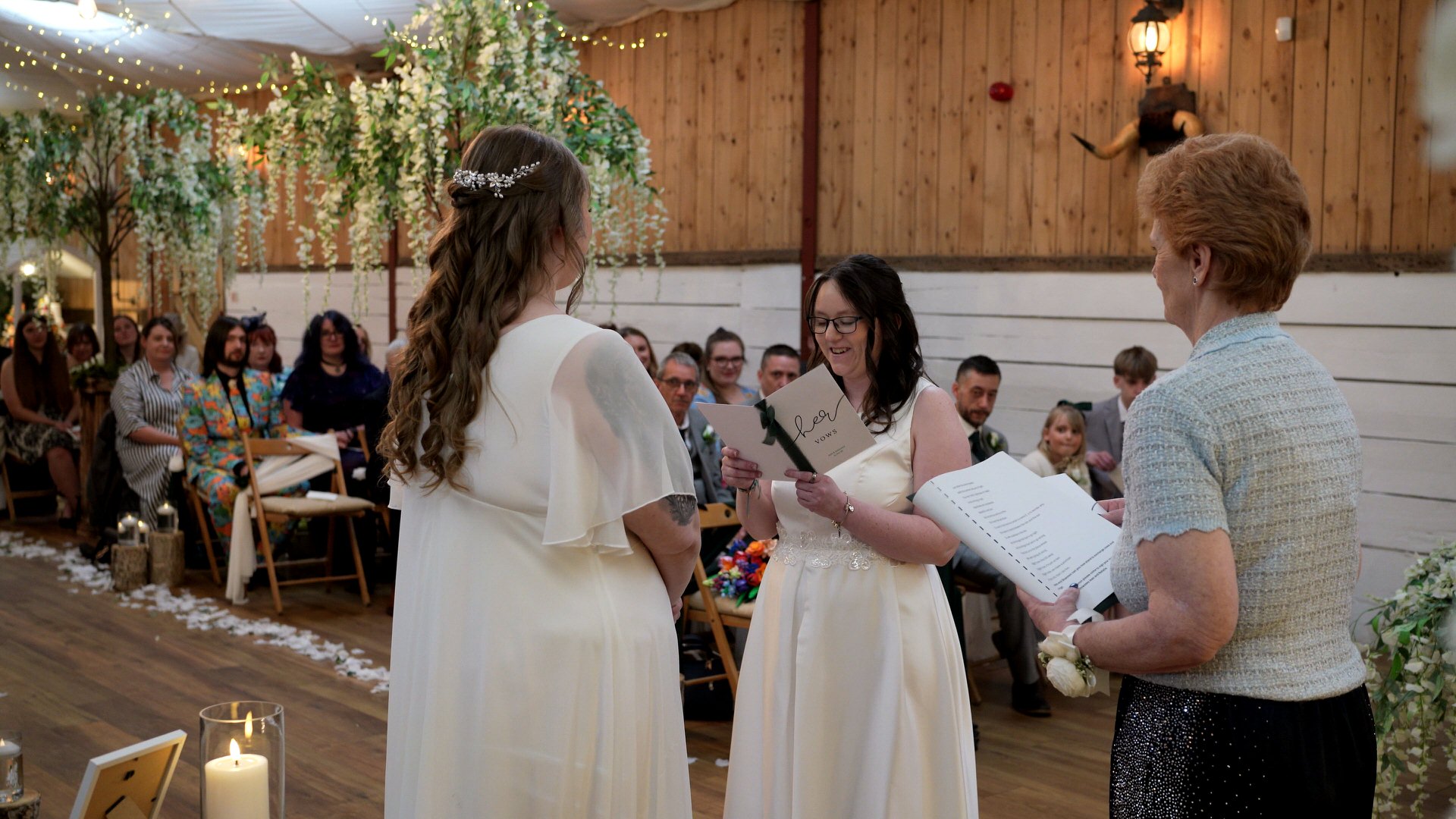 a bride reads her personal vows during a celebrant led wedding ceremony at the wellbeing farm in Bolton Lancashire