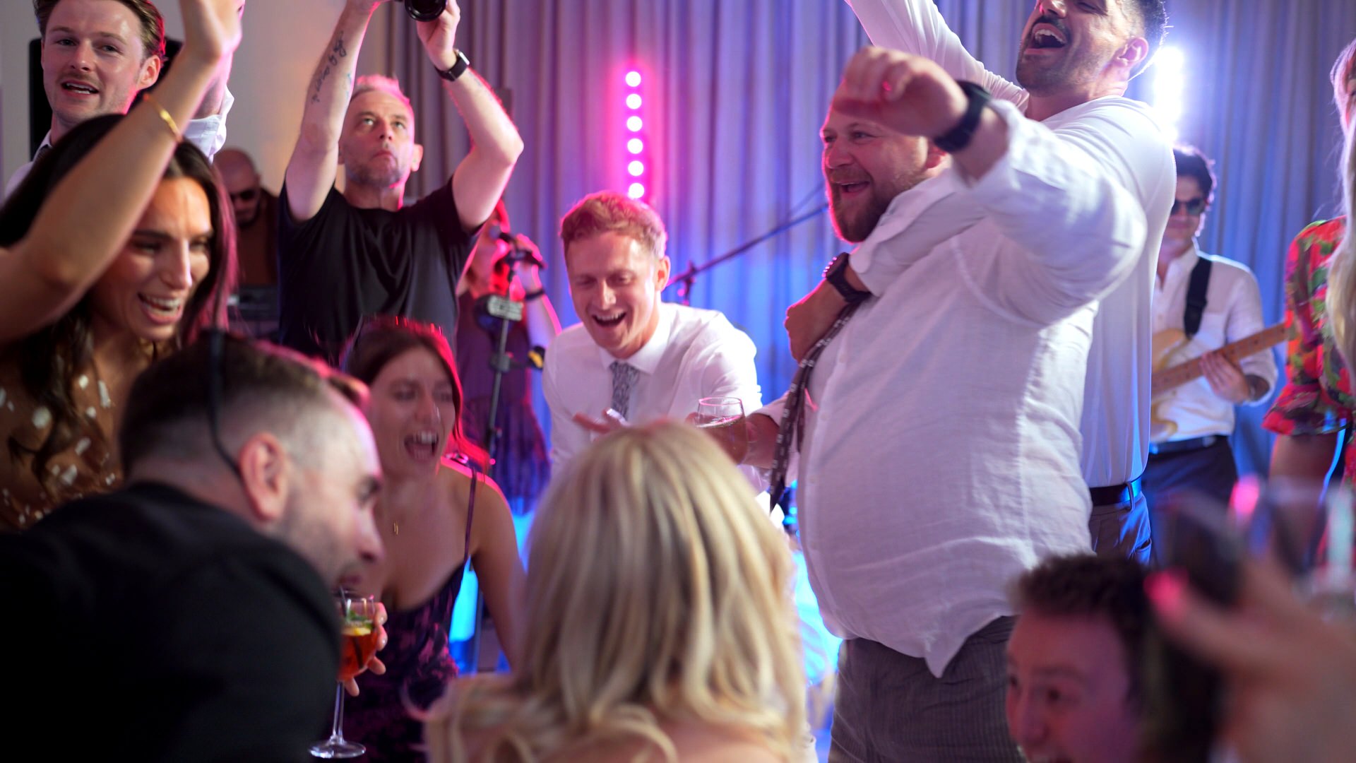 a packed dancefloor captured by a videographer at Iscoyd Park